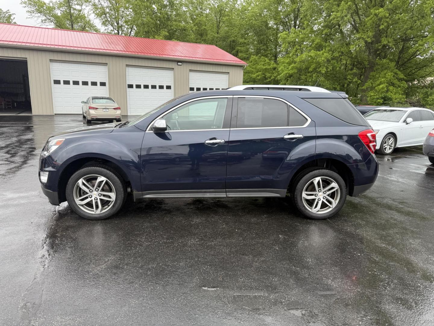 2016 Blue /Black Chevrolet Equinox LTZ 2WD (2GNALDEK1G6) with an 2.4L L4 DOHC 16V engine, 6-Speed Automatic transmission, located at 547 E. Main St., Orwell, OH, 44076, (440) 437-5893, 41.535435, -80.847855 - Photo#12