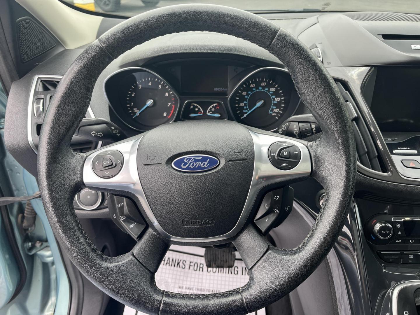 2013 Blue /Black Ford Escape Titanium 4WD (1FMCU9J99DU) with an 2.0L I4 DOHC 16V Turbo engine, 6-Speed Automatic transmission, located at 547 E. Main St., Orwell, OH, 44076, (440) 437-5893, 41.535435, -80.847855 - This 2013 Ford Escape is as loaded as an Escape can be. Powered by a 2.0 I4 Turbocharged EcoBoost engine and a 6 speed automatic transmission this Escape is quick yet fuel efficient. On the Inside you get a leather interior, power drivers seat W/ drivers memory functions, heated front seats and, a d - Photo#17