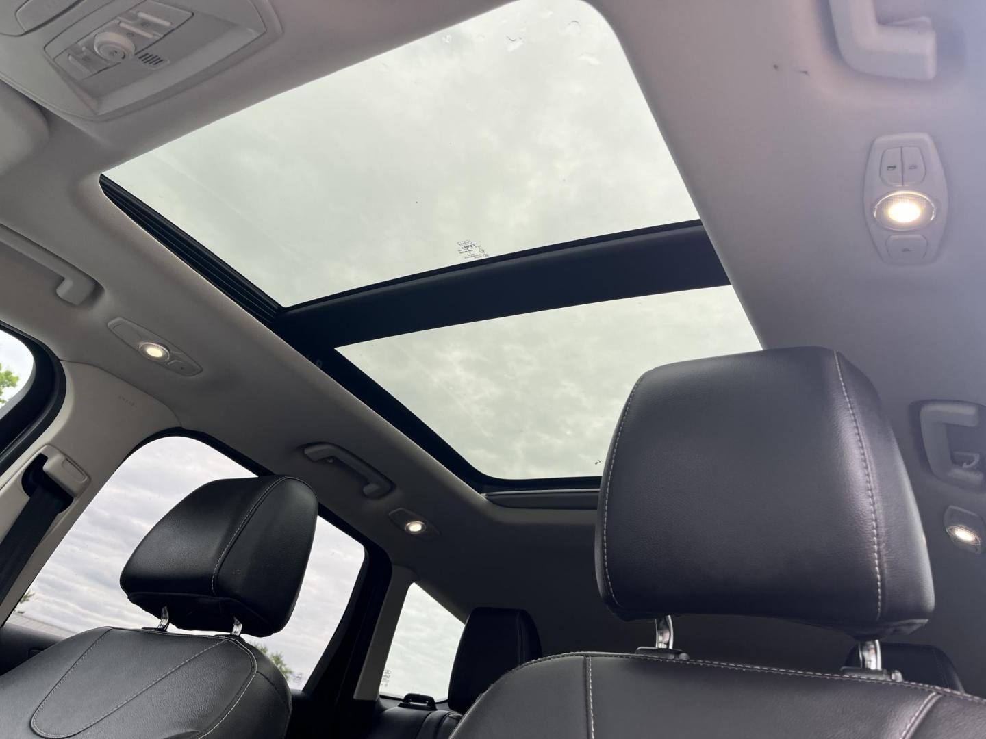 2013 Blue /Black Ford Escape Titanium 4WD (1FMCU9J99DU) with an 2.0L I4 DOHC 16V Turbo engine, 6-Speed Automatic transmission, located at 547 E. Main St., Orwell, OH, 44076, (440) 437-5893, 41.535435, -80.847855 - This 2013 Ford Escape is as loaded as an Escape can be. Powered by a 2.0 I4 Turbocharged EcoBoost engine and a 6 speed automatic transmission this Escape is quick yet fuel efficient. On the Inside you get a leather interior, power drivers seat W/ drivers memory functions, heated front seats and, a d - Photo#27