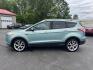 2013 Blue /Black Ford Escape Titanium 4WD (1FMCU9J99DU) with an 2.0L I4 DOHC 16V Turbo engine, 6-Speed Automatic transmission, located at 547 E. Main St., Orwell, OH, 44076, (440) 437-5893, 41.535435, -80.847855 - This 2013 Ford Escape is as loaded as an Escape can be. Powered by a 2.0 I4 Turbocharged EcoBoost engine and a 6 speed automatic transmission this Escape is quick yet fuel efficient. On the Inside you get a leather interior, power drivers seat W/ drivers memory functions, heated front seats and, a d - Photo#9