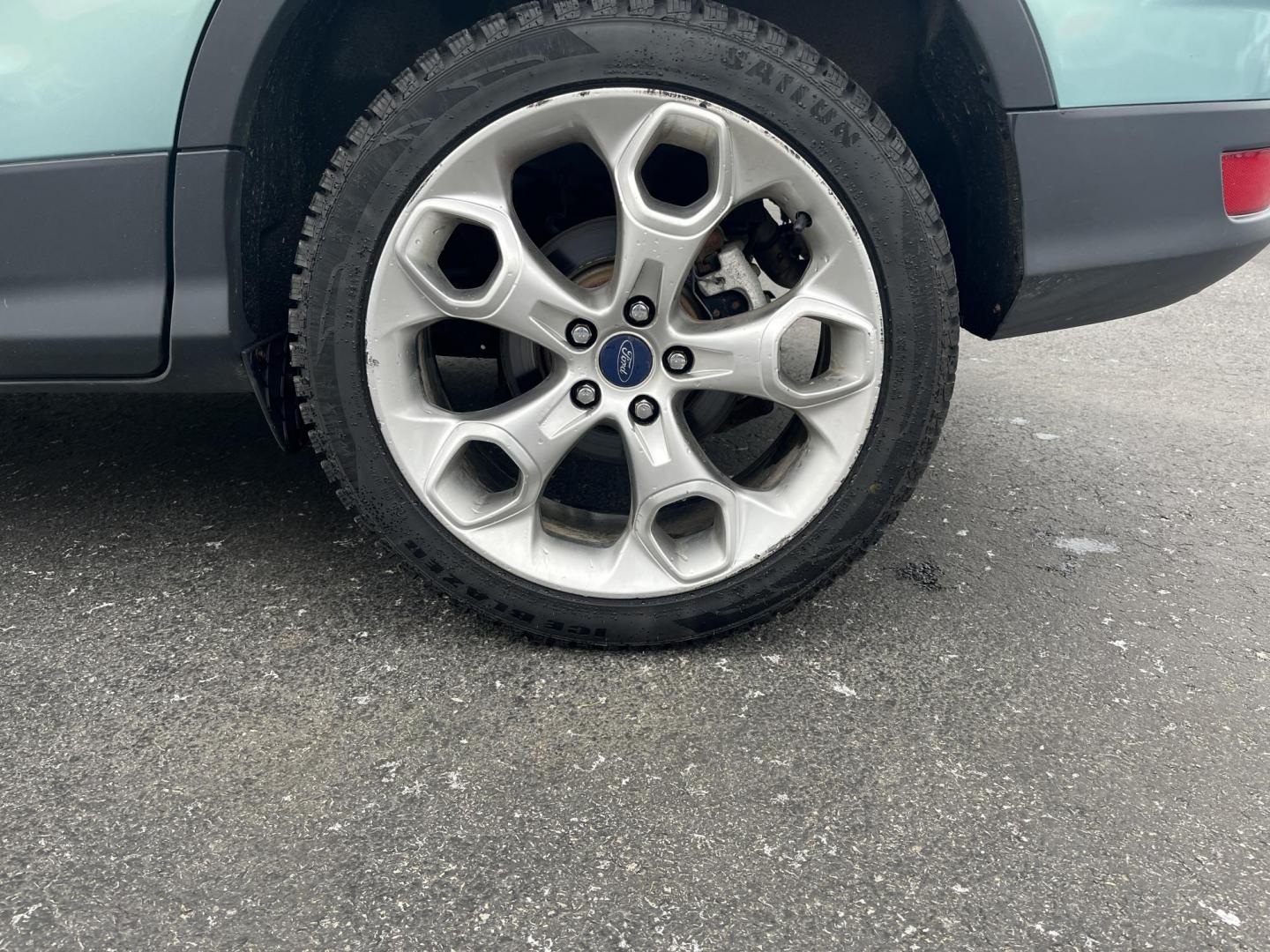 2013 Blue /Black Ford Escape Titanium 4WD (1FMCU9J99DU) with an 2.0L I4 DOHC 16V Turbo engine, 6-Speed Automatic transmission, located at 547 E. Main St., Orwell, OH, 44076, (440) 437-5893, 41.535435, -80.847855 - This 2013 Ford Escape is as loaded as an Escape can be. Powered by a 2.0 I4 Turbocharged EcoBoost engine and a 6 speed automatic transmission this Escape is quick yet fuel efficient. On the Inside you get a leather interior, power drivers seat W/ drivers memory functions, heated front seats and, a d - Photo#13