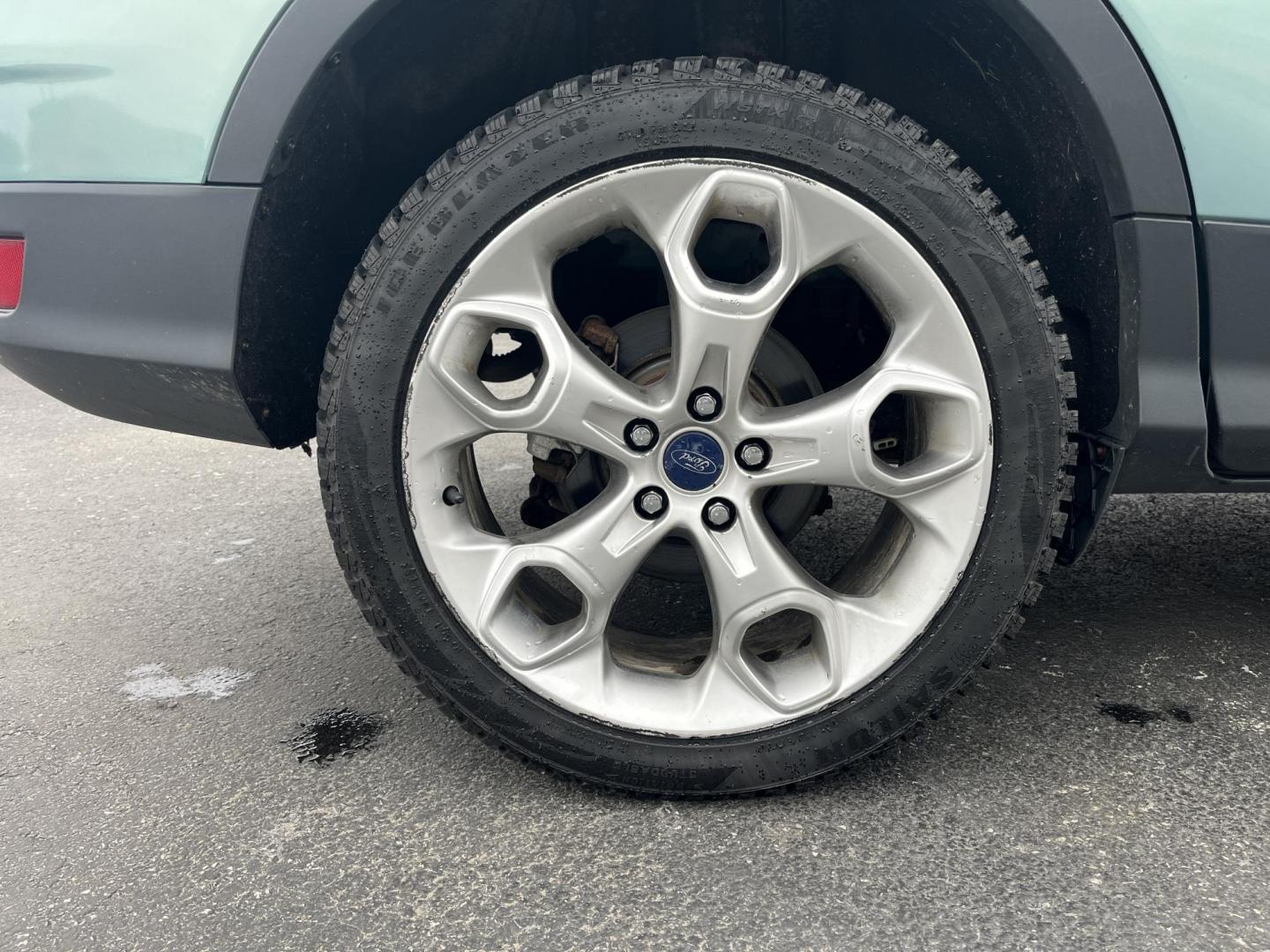 2013 Blue /Black Ford Escape Titanium 4WD (1FMCU9J99DU) with an 2.0L I4 DOHC 16V Turbo engine, 6-Speed Automatic transmission, located at 547 E. Main St., Orwell, OH, 44076, (440) 437-5893, 41.535435, -80.847855 - This 2013 Ford Escape is as loaded as an Escape can be. Powered by a 2.0 I4 Turbocharged EcoBoost engine and a 6 speed automatic transmission this Escape is quick yet fuel efficient. On the Inside you get a leather interior, power drivers seat W/ drivers memory functions, heated front seats and, a d - Photo#14
