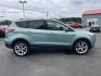 2013 Blue /Black Ford Escape Titanium 4WD (1FMCU9J99DU) with an 2.0L I4 DOHC 16V Turbo engine, 6-Speed Automatic transmission, located at 547 E. Main St., Orwell, OH, 44076, (440) 437-5893, 41.535435, -80.847855 - This 2013 Ford Escape is as loaded as an Escape can be. Powered by a 2.0 I4 Turbocharged EcoBoost engine and a 6 speed automatic transmission this Escape is quick yet fuel efficient. On the Inside you get a leather interior, power drivers seat W/ drivers memory functions, heated front seats and, a d - Photo#4