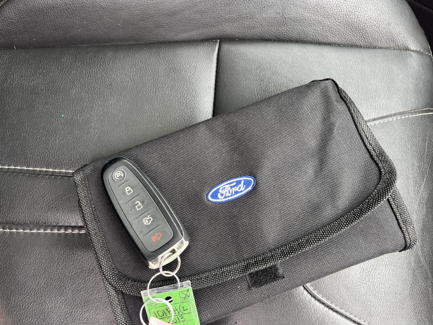 2013 Blue /Black Ford Escape Titanium 4WD (1FMCU9J99DU) with an 2.0L I4 DOHC 16V Turbo engine, 6-Speed Automatic transmission, located at 547 E. Main St., Orwell, OH, 44076, (440) 437-5893, 41.535435, -80.847855 - This 2013 Ford Escape is as loaded as an Escape can be. Powered by a 2.0 I4 Turbocharged EcoBoost engine and a 6 speed automatic transmission this Escape is quick yet fuel efficient. On the Inside you get a leather interior, power drivers seat W/ drivers memory functions, heated front seats and, a d - Photo#36