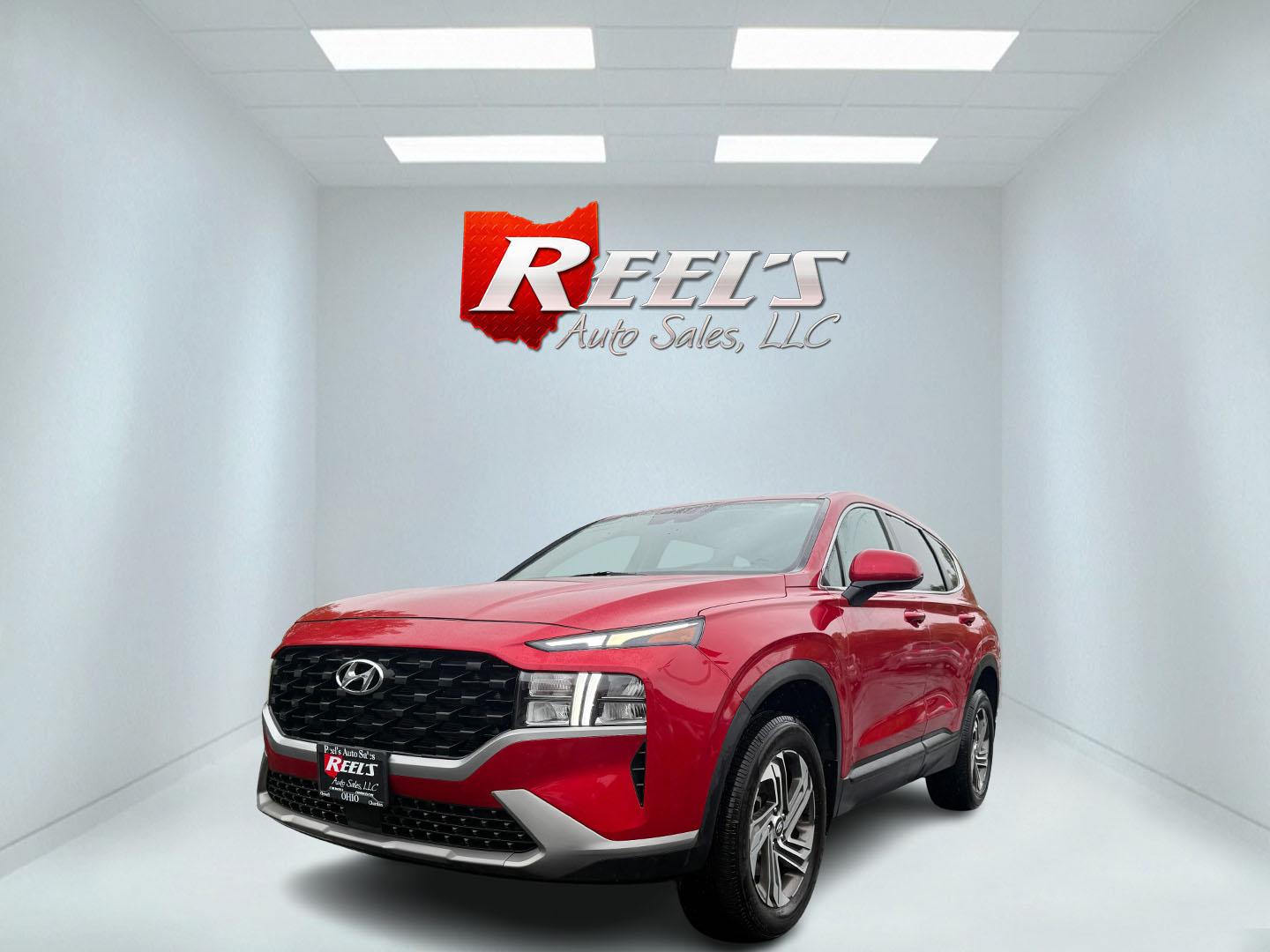 2022 Red /Black Hyundai Santa Fe SE AWD (5NMS1DAJ4NH) with an 2.5L I4 DOHC 16V engine, 8-Speed Automatic transmission, located at 547 E. Main St., Orwell, OH, 44076, (440) 437-5893, 41.535435, -80.847855 - Photo#0