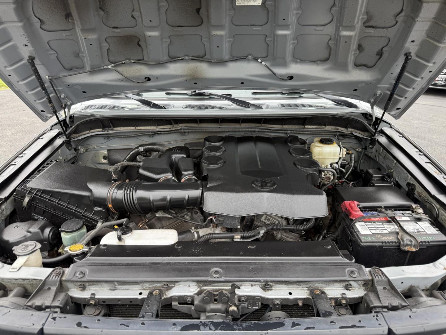 2013 Silver /Black Toyota FJ Cruiser 4WD AT (JTEBU4BF2DK) with an 4.0L V6 DOHC 24V engine, 5-Speed Automatic transmission, located at 11115 Chardon Rd. , Chardon, OH, 44024, (440) 214-9705, 41.580246, -81.241943 - This 2013 Toyota FJ Cruiser has Jeep off-road cred with Toyota's incredible reputation for reliability. Powered by the incredible 4.0 V6 and a 5 speed automatic transmission this thing has the grunt to go over any off-road obstacle or, tow 5,000 pounds. This FJ Cruiser has the off-road package, TRD - Photo#3