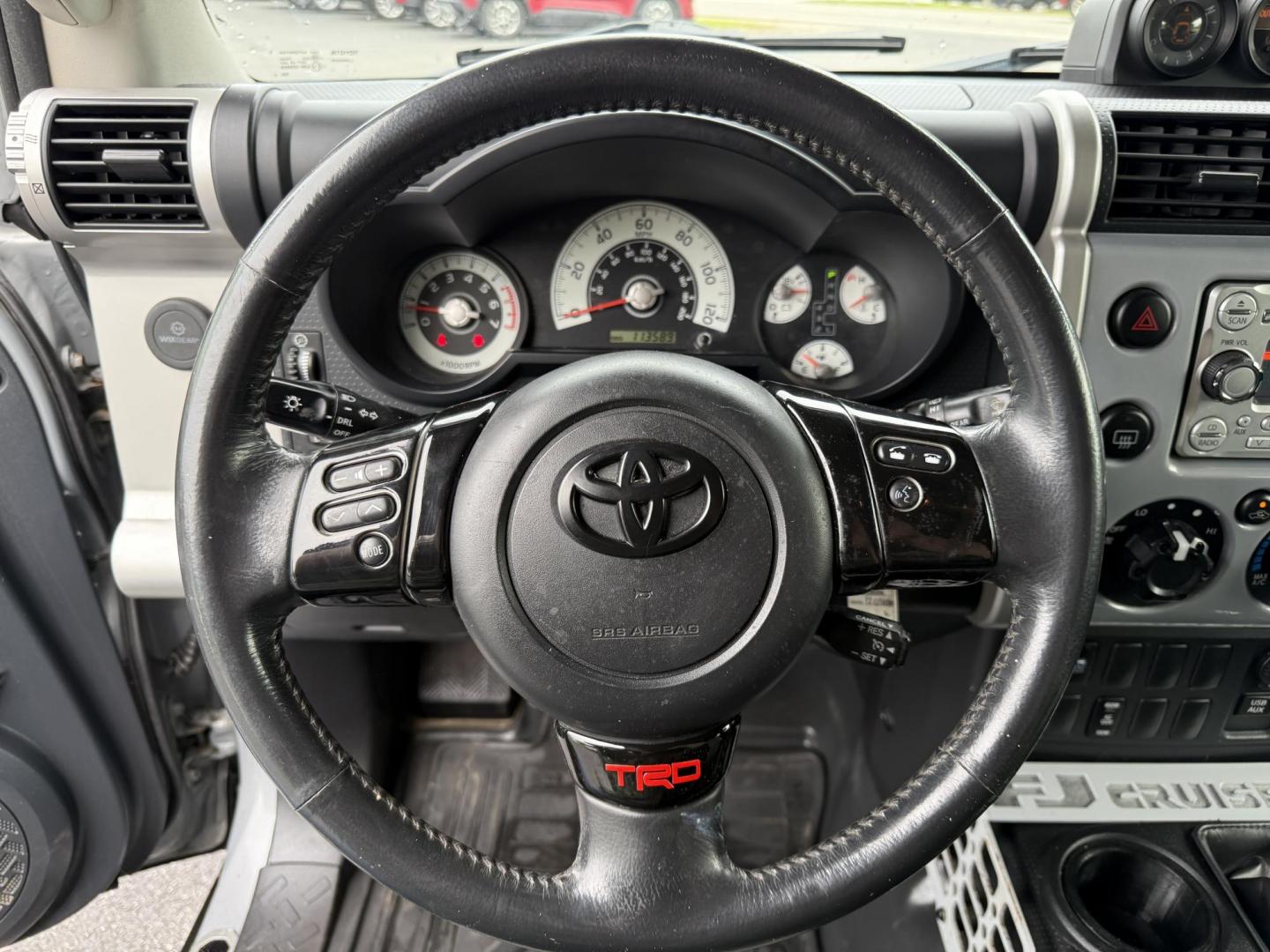 2013 Silver /Black Toyota FJ Cruiser 4WD AT (JTEBU4BF2DK) with an 4.0L V6 DOHC 24V engine, 5-Speed Automatic transmission, located at 11115 Chardon Rd. , Chardon, OH, 44024, (440) 214-9705, 41.580246, -81.241943 - This 2013 Toyota FJ Cruiser has Jeep off-road cred with Toyota's incredible reputation for reliability. Powered by the incredible 4.0 V6 and a 5 speed automatic transmission this thing has the grunt to go over any off-road obstacle or, tow 5,000 pounds. This FJ Cruiser has the off-road package, TRD - Photo#17