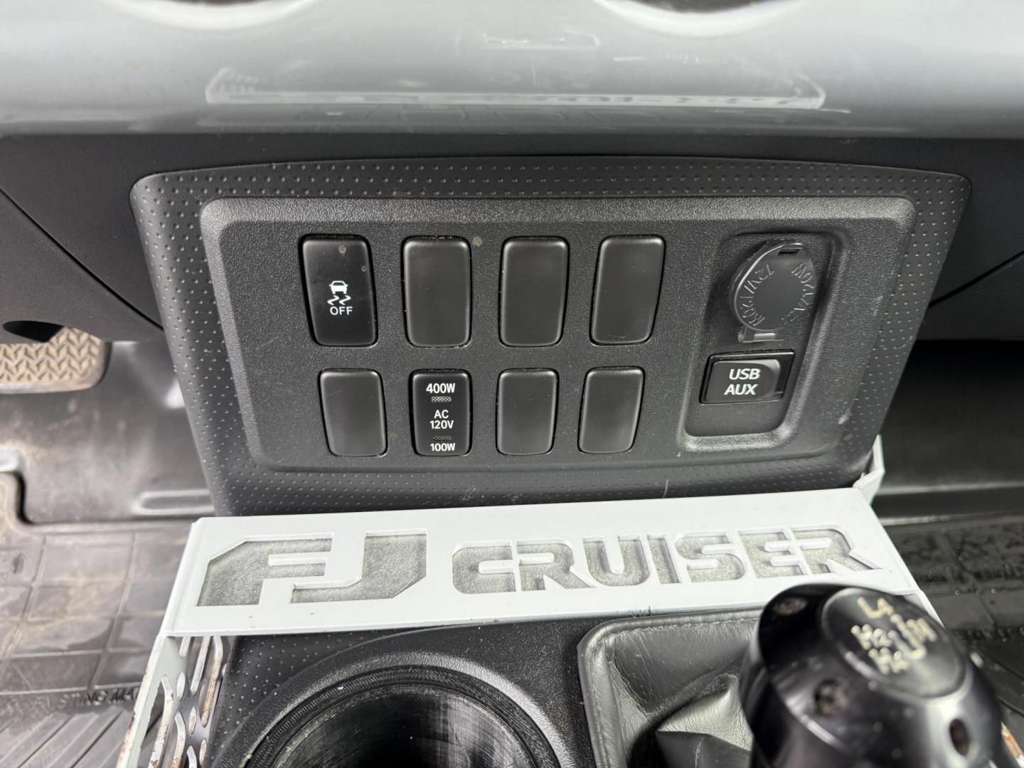 2013 Silver /Black Toyota FJ Cruiser 4WD AT (JTEBU4BF2DK) with an 4.0L V6 DOHC 24V engine, 5-Speed Automatic transmission, located at 11115 Chardon Rd. , Chardon, OH, 44024, (440) 214-9705, 41.580246, -81.241943 - This 2013 Toyota FJ Cruiser has Jeep off-road cred with Toyota's incredible reputation for reliability. Powered by the incredible 4.0 V6 and a 5 speed automatic transmission this thing has the grunt to go over any off-road obstacle or, tow 5,000 pounds. This FJ Cruiser has the off-road package, TRD - Photo#22