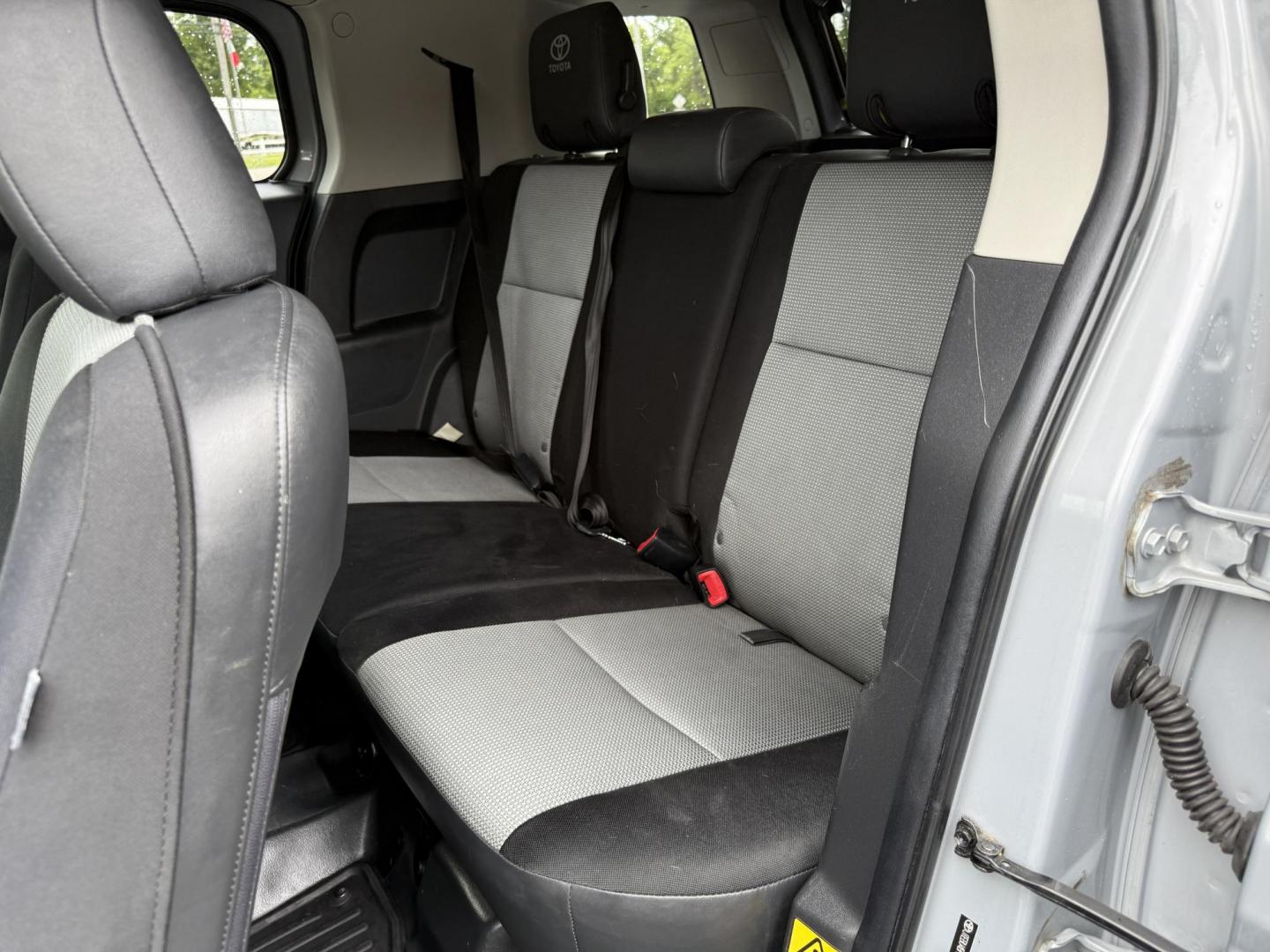 2013 Silver /Black Toyota FJ Cruiser 4WD AT (JTEBU4BF2DK) with an 4.0L V6 DOHC 24V engine, 5-Speed Automatic transmission, located at 11115 Chardon Rd. , Chardon, OH, 44024, (440) 214-9705, 41.580246, -81.241943 - This 2013 Toyota FJ Cruiser has Jeep off-road cred with Toyota's incredible reputation for reliability. Powered by the incredible 4.0 V6 and a 5 speed automatic transmission this thing has the grunt to go over any off-road obstacle or, tow 5,000 pounds. This FJ Cruiser has the off-road package, TRD - Photo#24