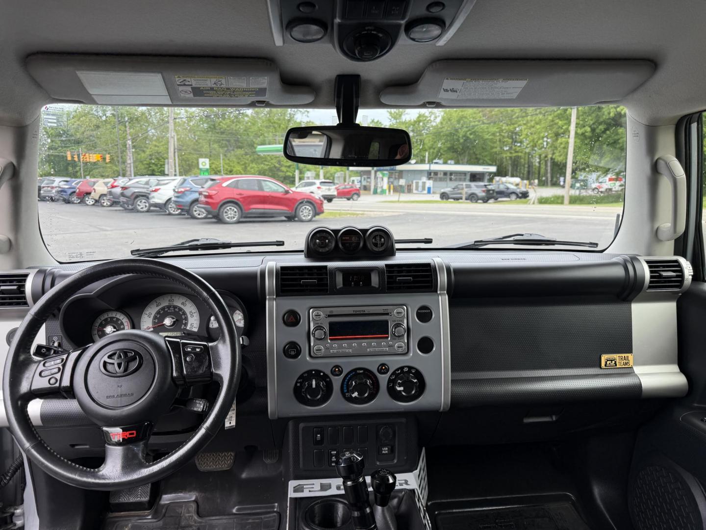 2013 Silver /Black Toyota FJ Cruiser 4WD AT (JTEBU4BF2DK) with an 4.0L V6 DOHC 24V engine, 5-Speed Automatic transmission, located at 11115 Chardon Rd. , Chardon, OH, 44024, (440) 214-9705, 41.580246, -81.241943 - This 2013 Toyota FJ Cruiser has Jeep off-road cred with Toyota's incredible reputation for reliability. Powered by the incredible 4.0 V6 and a 5 speed automatic transmission this thing has the grunt to go over any off-road obstacle or, tow 5,000 pounds. This FJ Cruiser has the off-road package, TRD - Photo#26