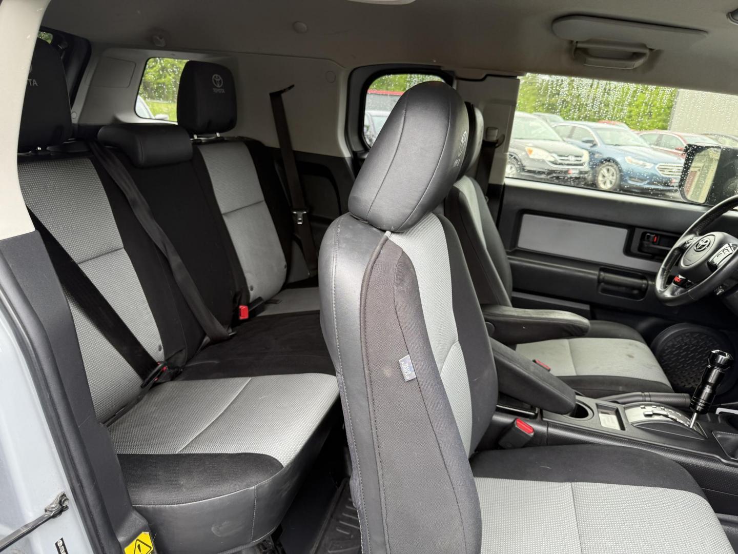 2013 Silver /Black Toyota FJ Cruiser 4WD AT (JTEBU4BF2DK) with an 4.0L V6 DOHC 24V engine, 5-Speed Automatic transmission, located at 11115 Chardon Rd. , Chardon, OH, 44024, (440) 214-9705, 41.580246, -81.241943 - This 2013 Toyota FJ Cruiser has Jeep off-road cred with Toyota's incredible reputation for reliability. Powered by the incredible 4.0 V6 and a 5 speed automatic transmission this thing has the grunt to go over any off-road obstacle or, tow 5,000 pounds. This FJ Cruiser has the off-road package, TRD - Photo#30