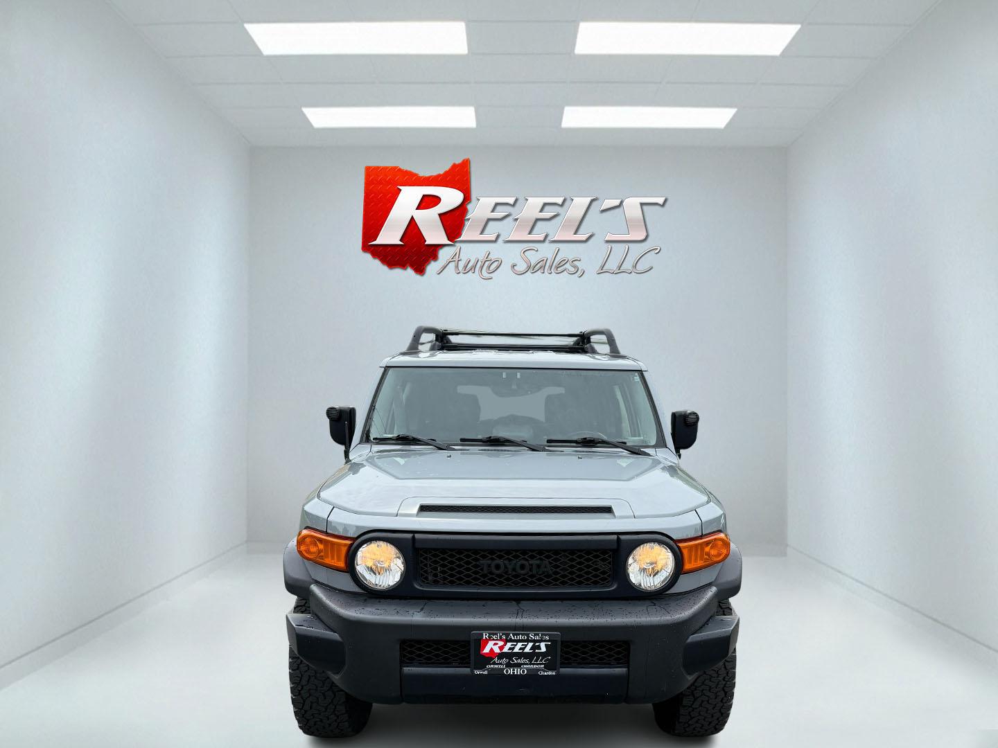 2013 Silver /Black Toyota FJ Cruiser 4WD AT (JTEBU4BF2DK) with an 4.0L V6 DOHC 24V engine, 5-Speed Automatic transmission, located at 11115 Chardon Rd. , Chardon, OH, 44024, (440) 214-9705, 41.580246, -81.241943 - This 2013 Toyota FJ Cruiser has Jeep off-road cred with Toyota's incredible reputation for reliability. Powered by the incredible 4.0 V6 and a 5 speed automatic transmission this thing has the grunt to go over any off-road obstacle or, tow 5,000 pounds. This FJ Cruiser has the off-road package, TRD - Photo#1