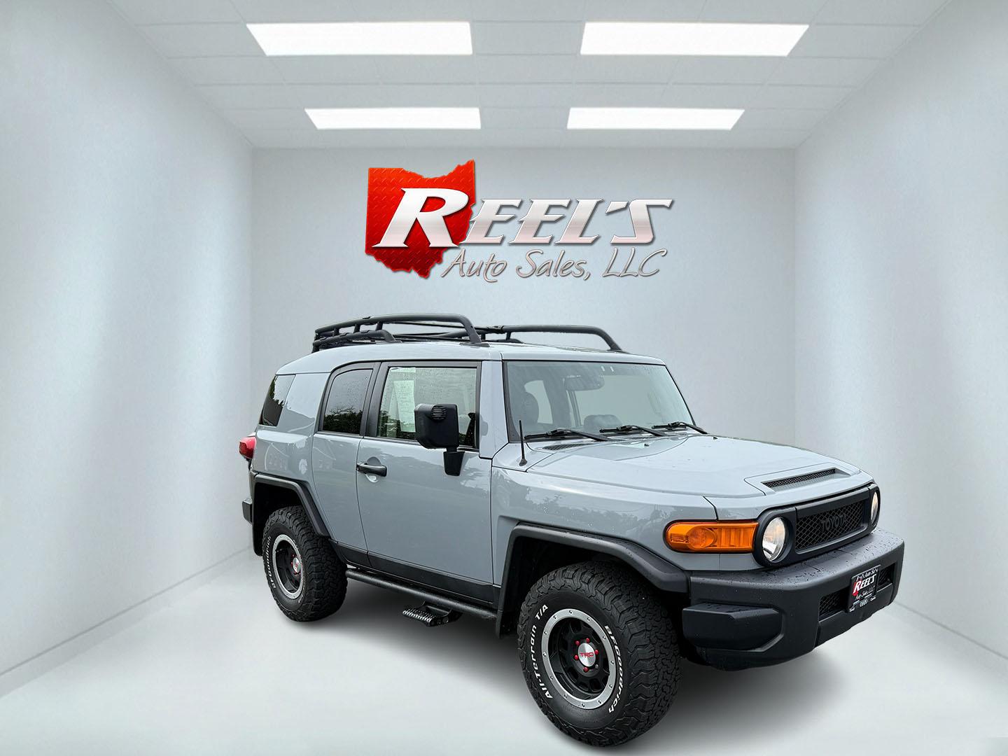 2013 Silver /Black Toyota FJ Cruiser 4WD AT (JTEBU4BF2DK) with an 4.0L V6 DOHC 24V engine, 5-Speed Automatic transmission, located at 11115 Chardon Rd. , Chardon, OH, 44024, (440) 214-9705, 41.580246, -81.241943 - This 2013 Toyota FJ Cruiser has Jeep off-road cred with Toyota's incredible reputation for reliability. Powered by the incredible 4.0 V6 and a 5 speed automatic transmission this thing has the grunt to go over any off-road obstacle or, tow 5,000 pounds. This FJ Cruiser has the off-road package, TRD - Photo#2