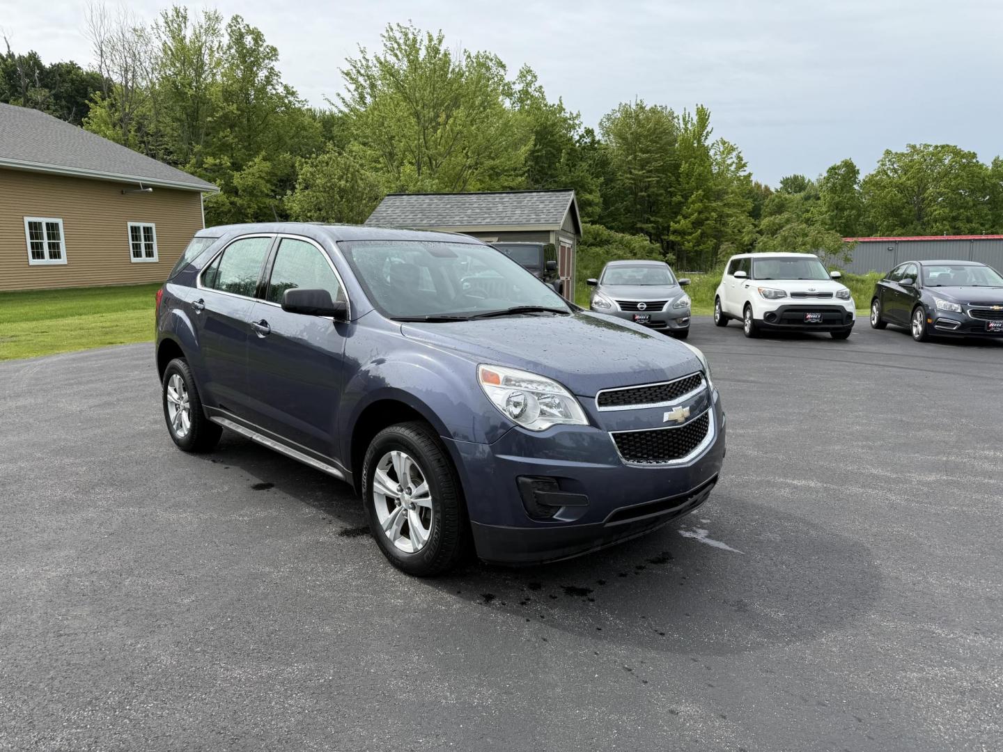 2014 Blue /Black Chevrolet Equinox LS 2WD (2GNALAEK9E6) with an 2.4L L4 DOHC 16V engine, 6-Speed Automatic transmission, located at 11115 Chardon Rd. , Chardon, OH, 44024, (440) 214-9705, 41.580246, -81.241943 - Photo#2