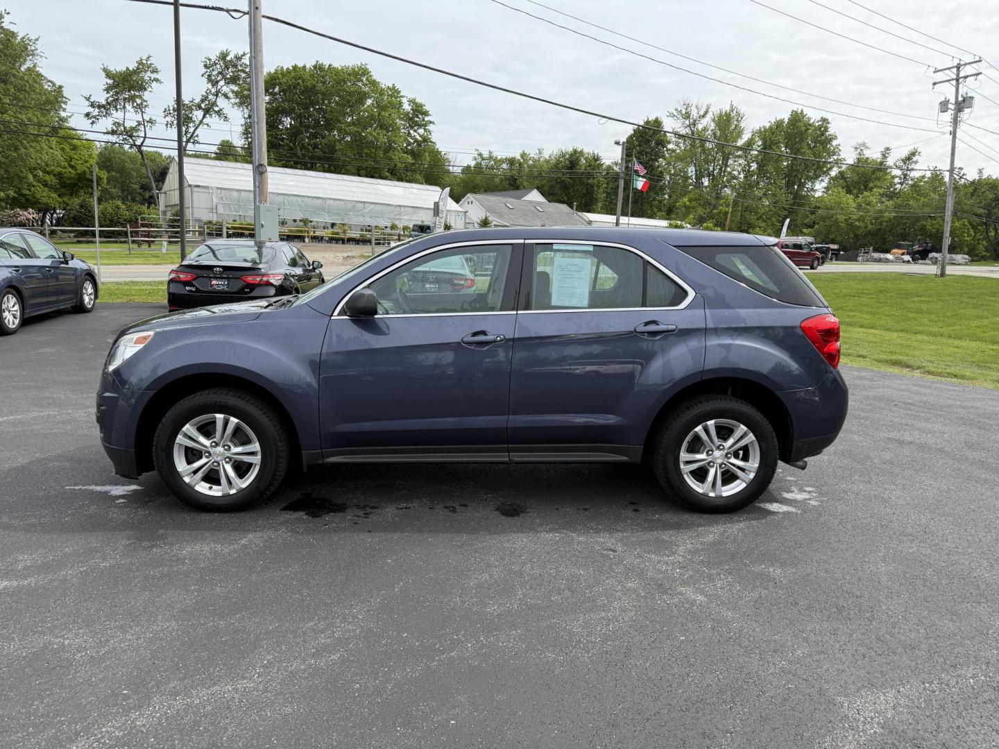 2014 Blue /Black Chevrolet Equinox LS 2WD (2GNALAEK9E6) with an 2.4L L4 DOHC 16V engine, 6-Speed Automatic transmission, located at 11115 Chardon Rd. , Chardon, OH, 44024, (440) 214-9705, 41.580246, -81.241943 - Photo#12