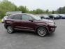 2016 Red /Black Lincoln MKC Reserve AWD (5LMCJ3D98GU) with an 2.0L I4 DOHC 16V Turbo engine, 6-Speed Automatic transmission, located at 11115 Chardon Rd. , Chardon, OH, 44024, (440) 214-9705, 41.580246, -81.241943 - Photo#3
