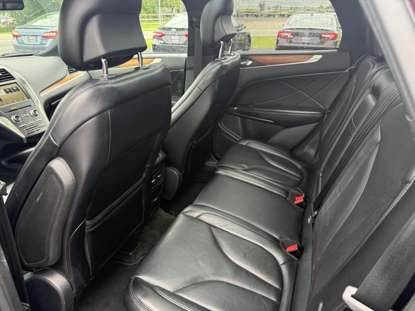 2016 Red /Black Lincoln MKC Reserve AWD (5LMCJ3D98GU) with an 2.0L I4 DOHC 16V Turbo engine, 6-Speed Automatic transmission, located at 11115 Chardon Rd. , Chardon, OH, 44024, (440) 214-9705, 41.580246, -81.241943 - Photo#35