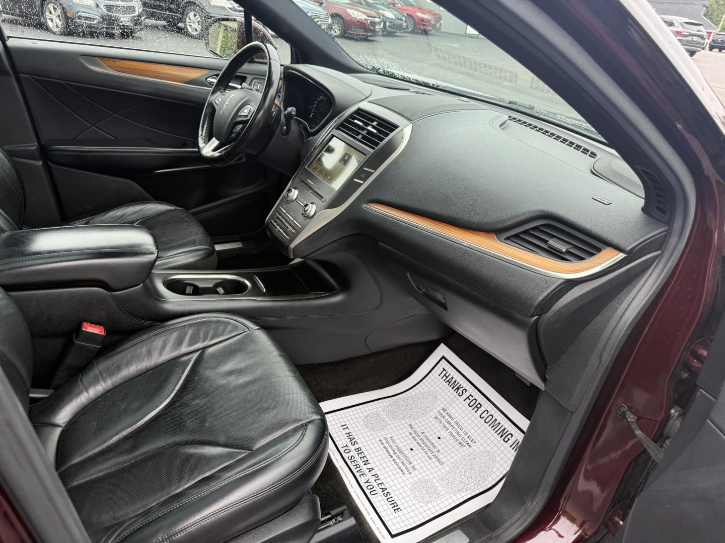 2016 Red /Black Lincoln MKC Reserve AWD (5LMCJ3D98GU) with an 2.0L I4 DOHC 16V Turbo engine, 6-Speed Automatic transmission, located at 11115 Chardon Rd. , Chardon, OH, 44024, (440) 214-9705, 41.580246, -81.241943 - Photo#44