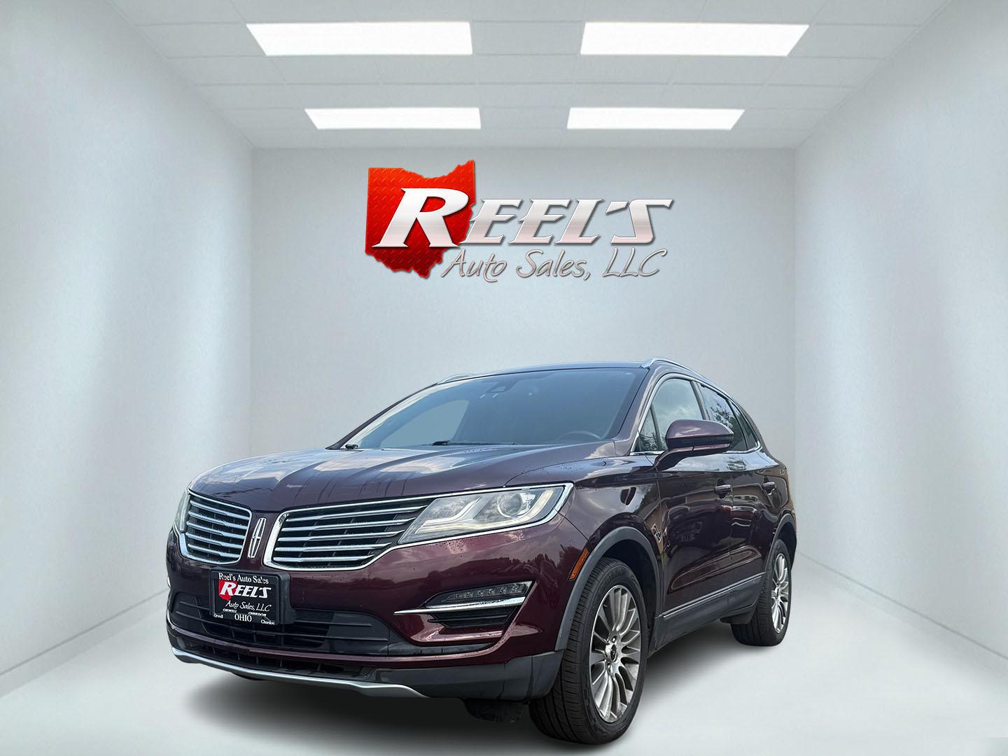 2016 Red /Black Lincoln MKC Reserve AWD (5LMCJ3D98GU) with an 2.0L I4 DOHC 16V Turbo engine, 6-Speed Automatic transmission, located at 11115 Chardon Rd. , Chardon, OH, 44024, (440) 214-9705, 41.580246, -81.241943 - This 2016 Lincoln MKC Reserve AWD is a super luxurious SUV. Powered by a 2.0 I4 EcoBoost engine and a 6 speed automatic this SUV is peppy yet fuel efficient achieving up to 26 MPG highway. The interior has leather and soft touch materials making it punch above it's class in fit and finish. Inside yo - Photo#0