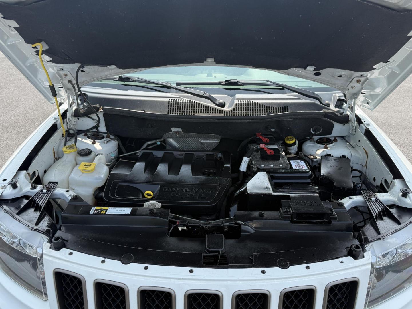 2016 White /Gray Jeep Compass Sport 75th Anniversary 4WD (1C4NJDBB9GD) with an 2.4L I4 DOHC 16V engine, 6-Speed Automatic transmission, located at 11115 Chardon Rd. , Chardon, OH, 44024, (440) 214-9705, 41.580246, -81.241943 - This 2016 Jeep Compass Sport 4WD 75th Edition is a compact go anywhere SUV. Powered by a 2.4 I4 engine and a 6 speed automatic transmission this little Jeep is respectable on gas while still being able to tackle any weather condition that is thrown it's way. This Jeep gives you added peace of mind w - Photo#15