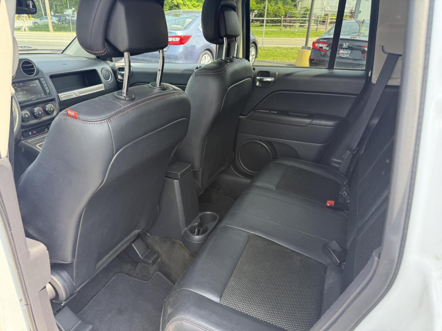 2016 White /Gray Jeep Compass Sport 75th Anniversary 4WD (1C4NJDBB9GD) with an 2.4L I4 DOHC 16V engine, 6-Speed Automatic transmission, located at 11115 Chardon Rd. , Chardon, OH, 44024, (440) 214-9705, 41.580246, -81.241943 - This 2016 Jeep Compass Sport 4WD 75th Edition is a compact go anywhere SUV. Powered by a 2.4 I4 engine and a 6 speed automatic transmission this little Jeep is respectable on gas while still being able to tackle any weather condition that is thrown it's way. This Jeep gives you added peace of mind w - Photo#30