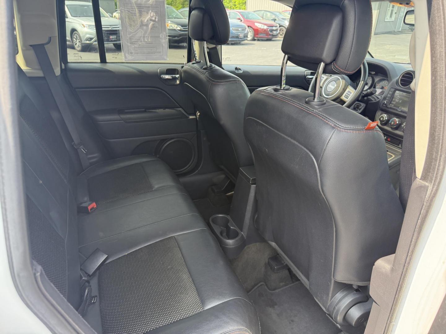 2016 White /Gray Jeep Compass Sport 75th Anniversary 4WD (1C4NJDBB9GD) with an 2.4L I4 DOHC 16V engine, 6-Speed Automatic transmission, located at 11115 Chardon Rd. , Chardon, OH, 44024, (440) 214-9705, 41.580246, -81.241943 - This 2016 Jeep Compass Sport 4WD 75th Edition is a compact go anywhere SUV. Powered by a 2.4 I4 engine and a 6 speed automatic transmission this little Jeep is respectable on gas while still being able to tackle any weather condition that is thrown it's way. This Jeep gives you added peace of mind w - Photo#35