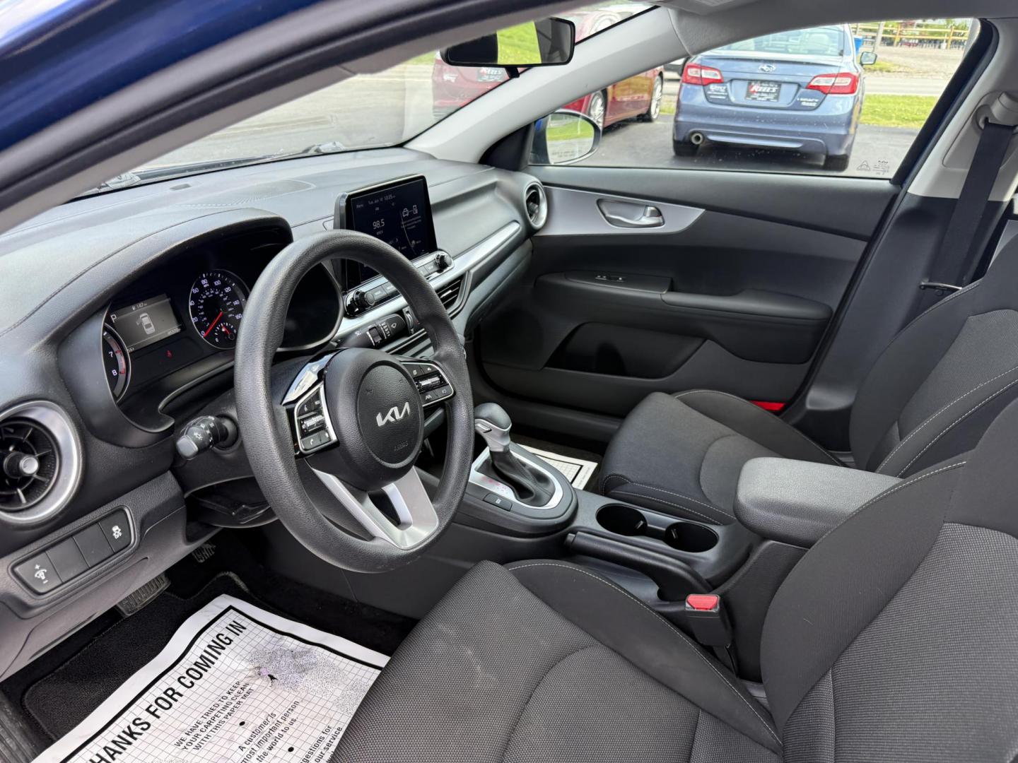 2023 Blue /Black Kia Forte LXS (3KPF24ADXPE) with an 2.0L I4 DOHC 16V engine, Automatic transmission, located at 11115 Chardon Rd. , Chardon, OH, 44024, (440) 214-9705, 41.580246, -81.241943 - This 2023 Kia Forte LXS is a fuel efficient and technologically advanced compact sedan. Powered by a 2.0 I4 GDI engine this Kia is capable of achieving up to 39 MPG highway. On the safety side you get forward collision warning W/ automatic emergency braking, lane keep assist, driver attention alert - Photo#7
