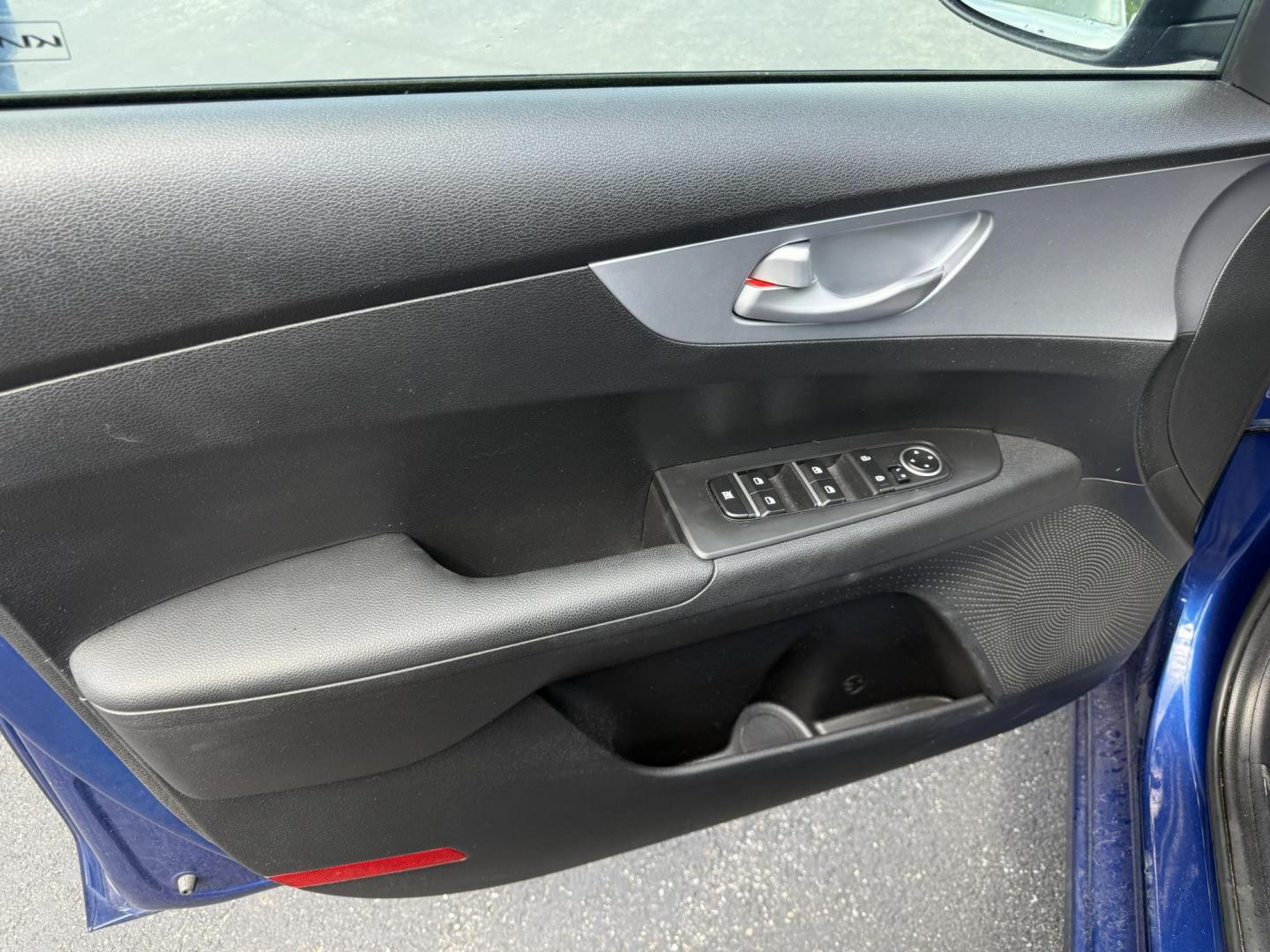 2023 Blue /Black Kia Forte LXS (3KPF24ADXPE) with an 2.0L I4 DOHC 16V engine, Automatic transmission, located at 11115 Chardon Rd. , Chardon, OH, 44024, (440) 214-9705, 41.580246, -81.241943 - This 2023 Kia Forte LXS is a fuel efficient and technologically advanced compact sedan. Powered by a 2.0 I4 GDI engine this Kia is capable of achieving up to 39 MPG highway. On the safety side you get forward collision warning W/ automatic emergency braking, lane keep assist, driver attention alert - Photo#8