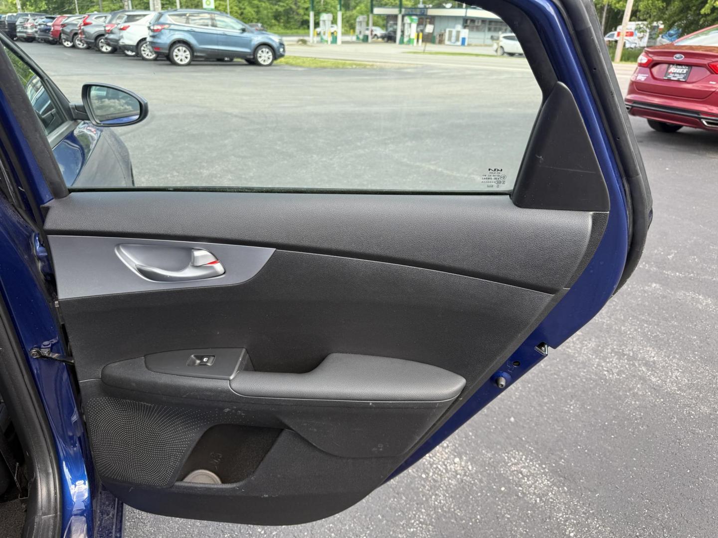 2023 Blue /Black Kia Forte LXS (3KPF24ADXPE) with an 2.0L I4 DOHC 16V engine, Automatic transmission, located at 11115 Chardon Rd. , Chardon, OH, 44024, (440) 214-9705, 41.580246, -81.241943 - This 2023 Kia Forte LXS is a fuel efficient and technologically advanced compact sedan. Powered by a 2.0 I4 GDI engine this Kia is capable of achieving up to 39 MPG highway. On the safety side you get forward collision warning W/ automatic emergency braking, lane keep assist, driver attention alert - Photo#27