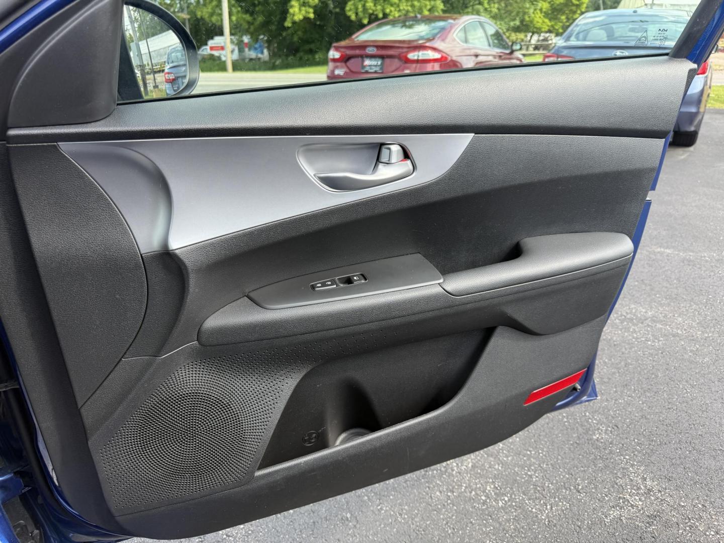 2023 Blue /Black Kia Forte LXS (3KPF24ADXPE) with an 2.0L I4 DOHC 16V engine, Automatic transmission, located at 11115 Chardon Rd. , Chardon, OH, 44024, (440) 214-9705, 41.580246, -81.241943 - This 2023 Kia Forte LXS is a fuel efficient and technologically advanced compact sedan. Powered by a 2.0 I4 GDI engine this Kia is capable of achieving up to 39 MPG highway. On the safety side you get forward collision warning W/ automatic emergency braking, lane keep assist, driver attention alert - Photo#31
