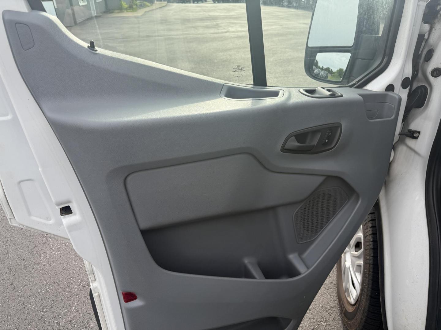 2016 White /Gray Ford Transit 350 Wagon Med. Roof XL w/Sliding Pass. 148-in. WB (1FBAX2CM5GK) with an 3.7L V6 DOHC 24V engine, 6A transmission, located at 11115 Chardon Rd. , Chardon, OH, 44024, (440) 214-9705, 41.580246, -81.241943 - This 2016 Ford Transit 350 XLT Medium Roof is a versatile full-size van powered by a 3.7L V6 engine with a 6-speed automatic transmission and flex fuel capability, featuring 3.73 rear gearing for added performance and a 5,000-pound towing capacity. It offers seating for up to 15 passengers, making i - Photo#9