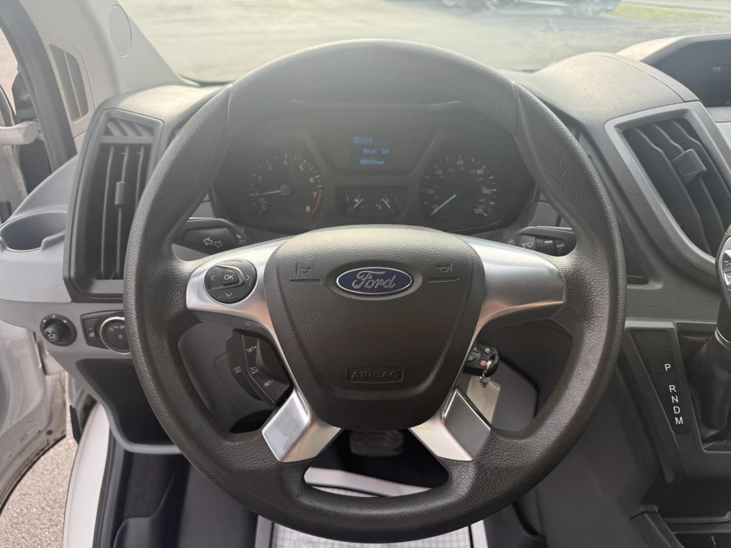 2016 White /Gray Ford Transit 350 Wagon Med. Roof XL w/Sliding Pass. 148-in. WB (1FBAX2CM5GK) with an 3.7L V6 DOHC 24V engine, 6A transmission, located at 11115 Chardon Rd. , Chardon, OH, 44024, (440) 214-9705, 41.580246, -81.241943 - This 2016 Ford Transit 350 XLT Medium Roof is a versatile full-size van powered by a 3.7L V6 engine with a 6-speed automatic transmission and flex fuel capability, featuring 3.73 rear gearing for added performance and a 5,000-pound towing capacity. It offers seating for up to 15 passengers, making i - Photo#13