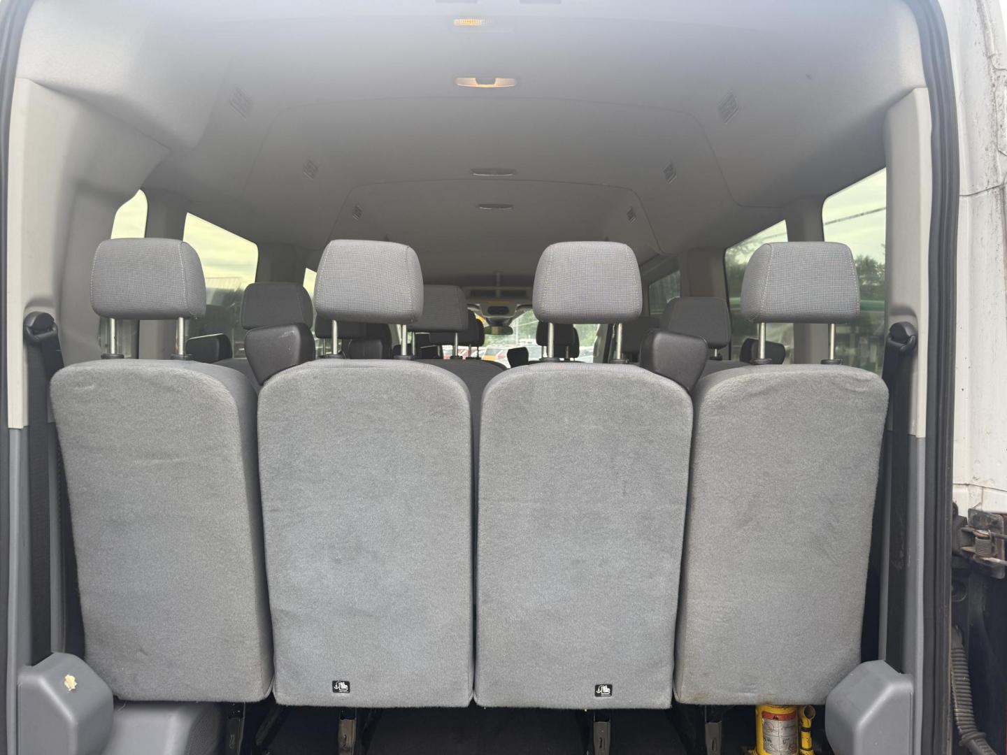 2016 White /Gray Ford Transit 350 Wagon Med. Roof XL w/Sliding Pass. 148-in. WB (1FBAX2CM5GK) with an 3.7L V6 DOHC 24V engine, 6A transmission, located at 11115 Chardon Rd. , Chardon, OH, 44024, (440) 214-9705, 41.580246, -81.241943 - This 2016 Ford Transit 350 XLT Medium Roof is a versatile full-size van powered by a 3.7L V6 engine with a 6-speed automatic transmission and flex fuel capability, featuring 3.73 rear gearing for added performance and a 5,000-pound towing capacity. It offers seating for up to 15 passengers, making i - Photo#20