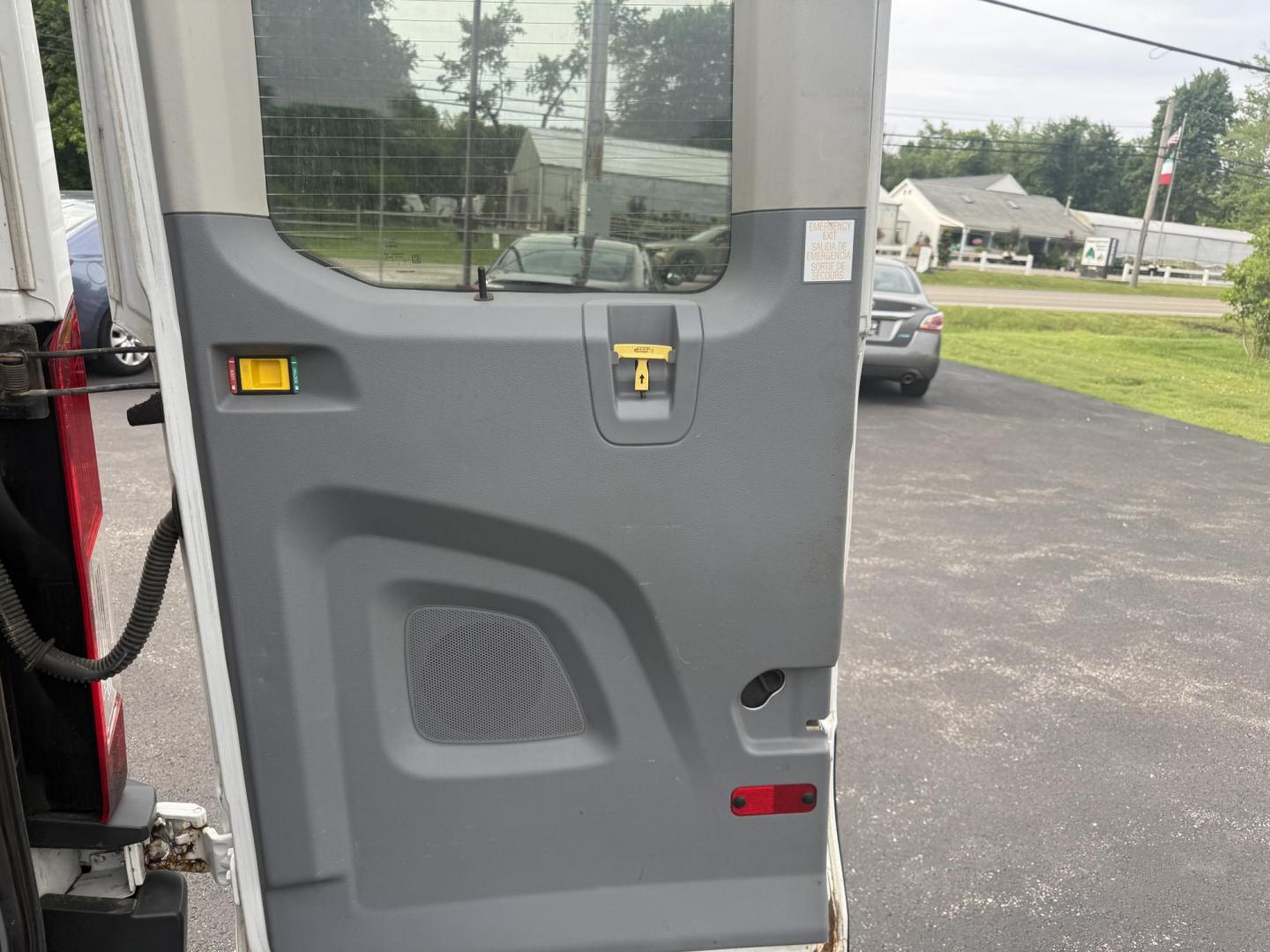 2016 White /Gray Ford Transit 350 Wagon Med. Roof XL w/Sliding Pass. 148-in. WB (1FBAX2CM5GK) with an 3.7L V6 DOHC 24V engine, 6A transmission, located at 11115 Chardon Rd. , Chardon, OH, 44024, (440) 214-9705, 41.580246, -81.241943 - This 2016 Ford Transit 350 XLT Medium Roof is a versatile full-size van powered by a 3.7L V6 engine with a 6-speed automatic transmission and flex fuel capability, featuring 3.73 rear gearing for added performance and a 5,000-pound towing capacity. It offers seating for up to 15 passengers, making i - Photo#22