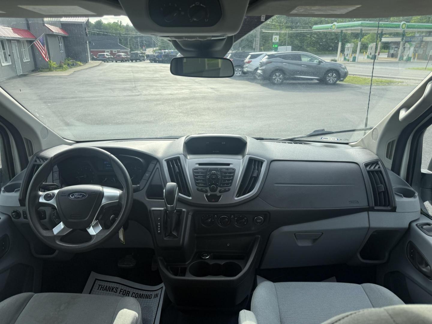 2016 White /Gray Ford Transit 350 Wagon Med. Roof XL w/Sliding Pass. 148-in. WB (1FBAX2CM5GK) with an 3.7L V6 DOHC 24V engine, 6A transmission, located at 11115 Chardon Rd. , Chardon, OH, 44024, (440) 214-9705, 41.580246, -81.241943 - This 2016 Ford Transit 350 XLT Medium Roof is a versatile full-size van powered by a 3.7L V6 engine with a 6-speed automatic transmission and flex fuel capability, featuring 3.73 rear gearing for added performance and a 5,000-pound towing capacity. It offers seating for up to 15 passengers, making i - Photo#24