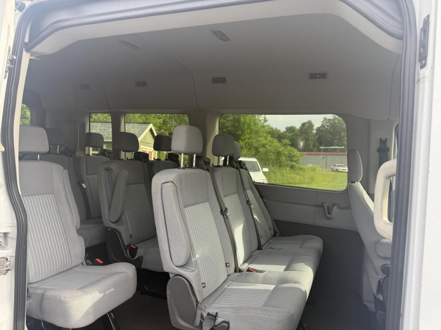 2016 White /Gray Ford Transit 350 Wagon Med. Roof XL w/Sliding Pass. 148-in. WB (1FBAX2CM5GK) with an 3.7L V6 DOHC 24V engine, 6A transmission, located at 11115 Chardon Rd. , Chardon, OH, 44024, (440) 214-9705, 41.580246, -81.241943 - This 2016 Ford Transit 350 XLT Medium Roof is a versatile full-size van powered by a 3.7L V6 engine with a 6-speed automatic transmission and flex fuel capability, featuring 3.73 rear gearing for added performance and a 5,000-pound towing capacity. It offers seating for up to 15 passengers, making i - Photo#23