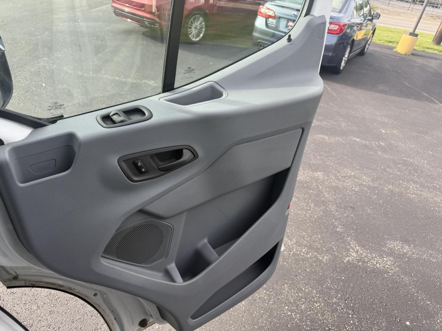2016 White /Gray Ford Transit 350 Wagon Med. Roof XL w/Sliding Pass. 148-in. WB (1FBAX2CM5GK) with an 3.7L V6 DOHC 24V engine, 6A transmission, located at 11115 Chardon Rd. , Chardon, OH, 44024, (440) 214-9705, 41.580246, -81.241943 - This 2016 Ford Transit 350 XLT Medium Roof is a versatile full-size van powered by a 3.7L V6 engine with a 6-speed automatic transmission and flex fuel capability, featuring 3.73 rear gearing for added performance and a 5,000-pound towing capacity. It offers seating for up to 15 passengers, making i - Photo#27