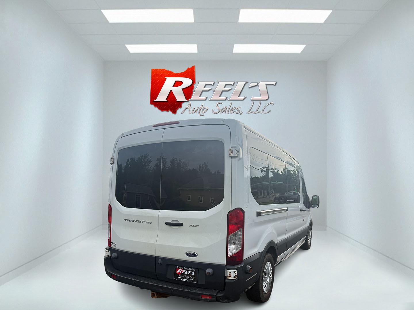 2016 White /Gray Ford Transit 350 Wagon Med. Roof XL w/Sliding Pass. 148-in. WB (1FBAX2CM5GK) with an 3.7L V6 DOHC 24V engine, 6A transmission, located at 11115 Chardon Rd. , Chardon, OH, 44024, (440) 214-9705, 41.580246, -81.241943 - This 2016 Ford Transit 350 XLT Medium Roof is a versatile full-size van powered by a 3.7L V6 engine with a 6-speed automatic transmission and flex fuel capability, featuring 3.73 rear gearing for added performance and a 5,000-pound towing capacity. It offers seating for up to 15 passengers, making i - Photo#30