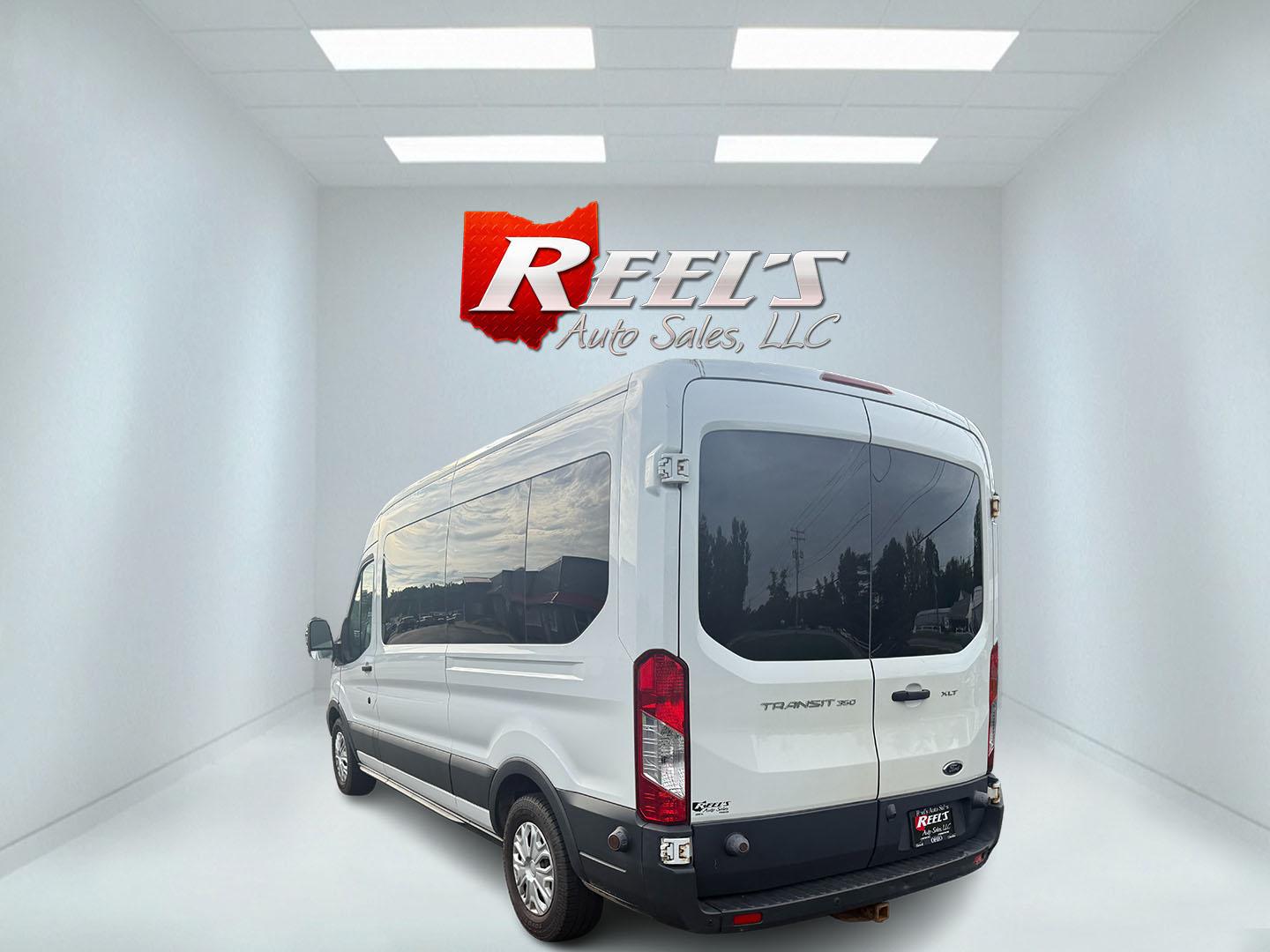 2016 White /Gray Ford Transit 350 Wagon Med. Roof XL w/Sliding Pass. 148-in. WB (1FBAX2CM5GK) with an 3.7L V6 DOHC 24V engine, 6A transmission, located at 11115 Chardon Rd. , Chardon, OH, 44024, (440) 214-9705, 41.580246, -81.241943 - This 2016 Ford Transit 350 XLT Medium Roof is a versatile full-size van powered by a 3.7L V6 engine with a 6-speed automatic transmission and flex fuel capability, featuring 3.73 rear gearing for added performance and a 5,000-pound towing capacity. It offers seating for up to 15 passengers, making i - Photo#32