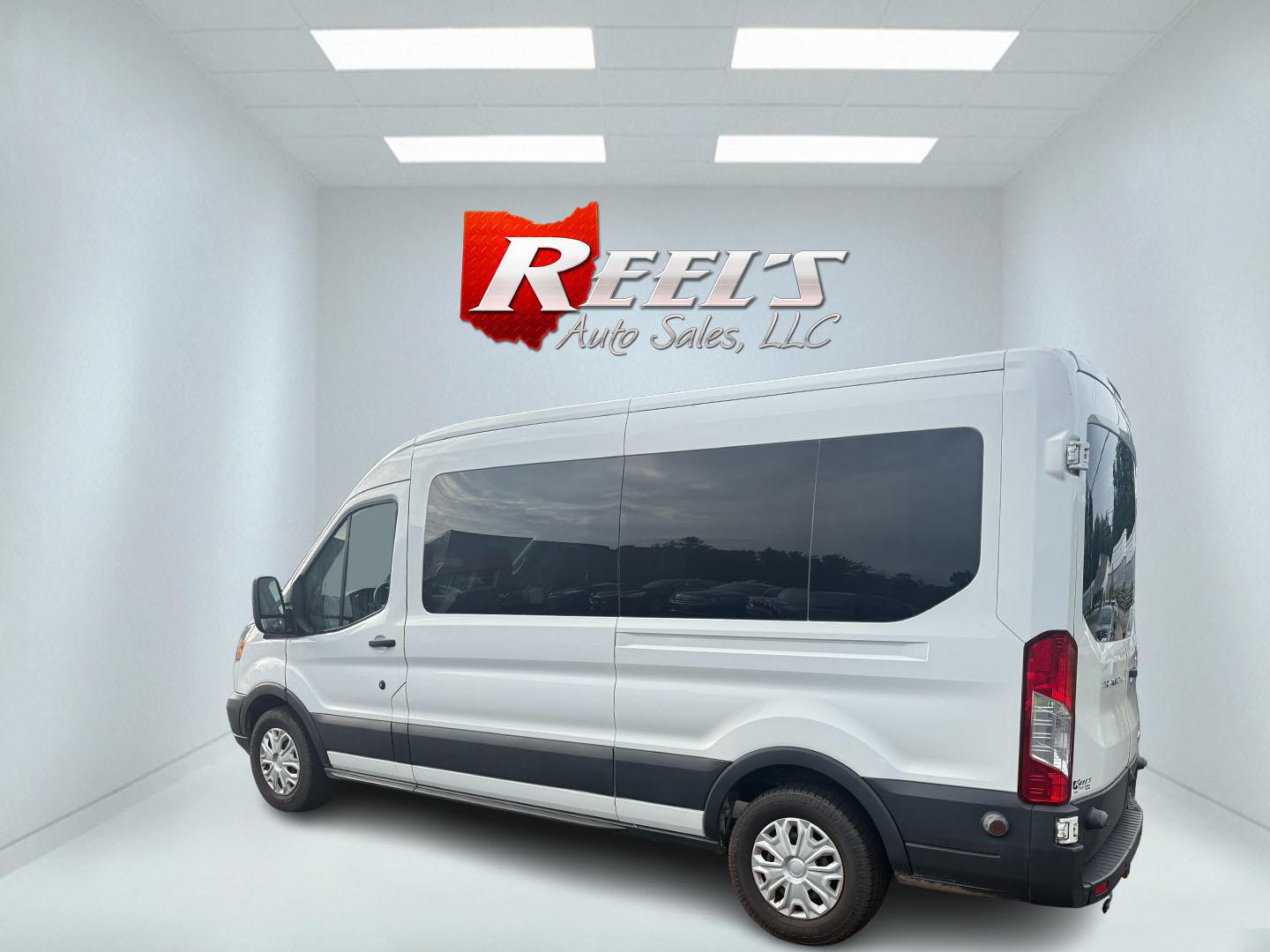2016 White /Gray Ford Transit 350 Wagon Med. Roof XL w/Sliding Pass. 148-in. WB (1FBAX2CM5GK) with an 3.7L V6 DOHC 24V engine, 6A transmission, located at 11115 Chardon Rd. , Chardon, OH, 44024, (440) 214-9705, 41.580246, -81.241943 - This 2016 Ford Transit 350 XLT Medium Roof is a versatile full-size van powered by a 3.7L V6 engine with a 6-speed automatic transmission and flex fuel capability, featuring 3.73 rear gearing for added performance and a 5,000-pound towing capacity. It offers seating for up to 15 passengers, making i - Photo#33