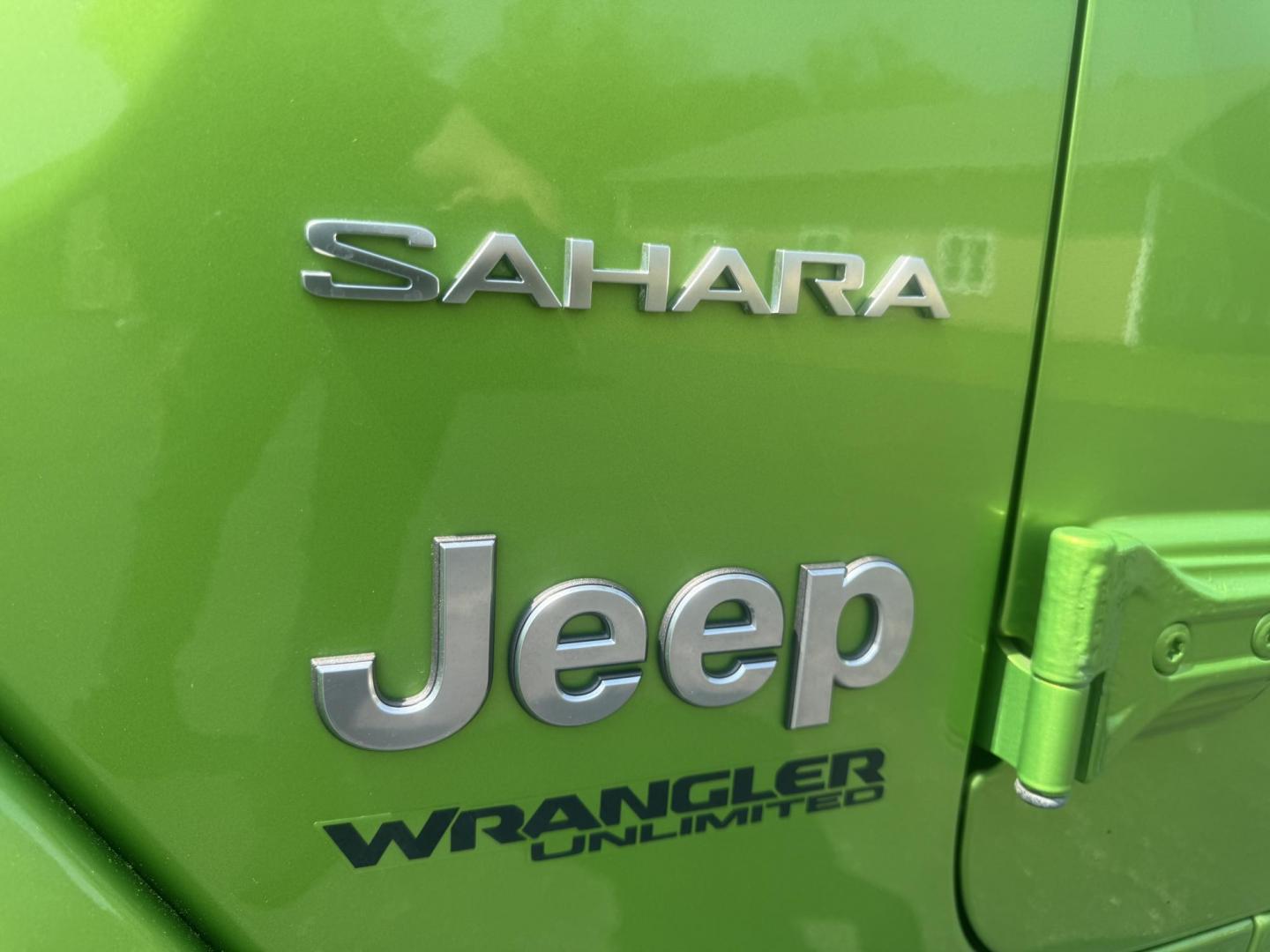 2019 Green /Black Jeep Wrangler Unlimited Sahara (1C4HJXEG1KW) with an 3.6L V6 DOHC 24V engine, 8-Speed Automatic transmission, located at 11115 Chardon Rd. , Chardon, OH, 44024, (440) 214-9705, 41.580246, -81.241943 - Photo#8