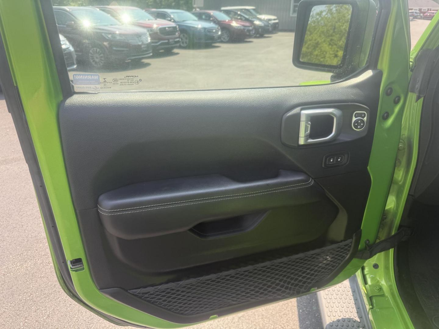2019 Green /Black Jeep Wrangler Unlimited Sahara (1C4HJXEG1KW) with an 3.6L V6 DOHC 24V engine, 8-Speed Automatic transmission, located at 11115 Chardon Rd. , Chardon, OH, 44024, (440) 214-9705, 41.580246, -81.241943 - Photo#11