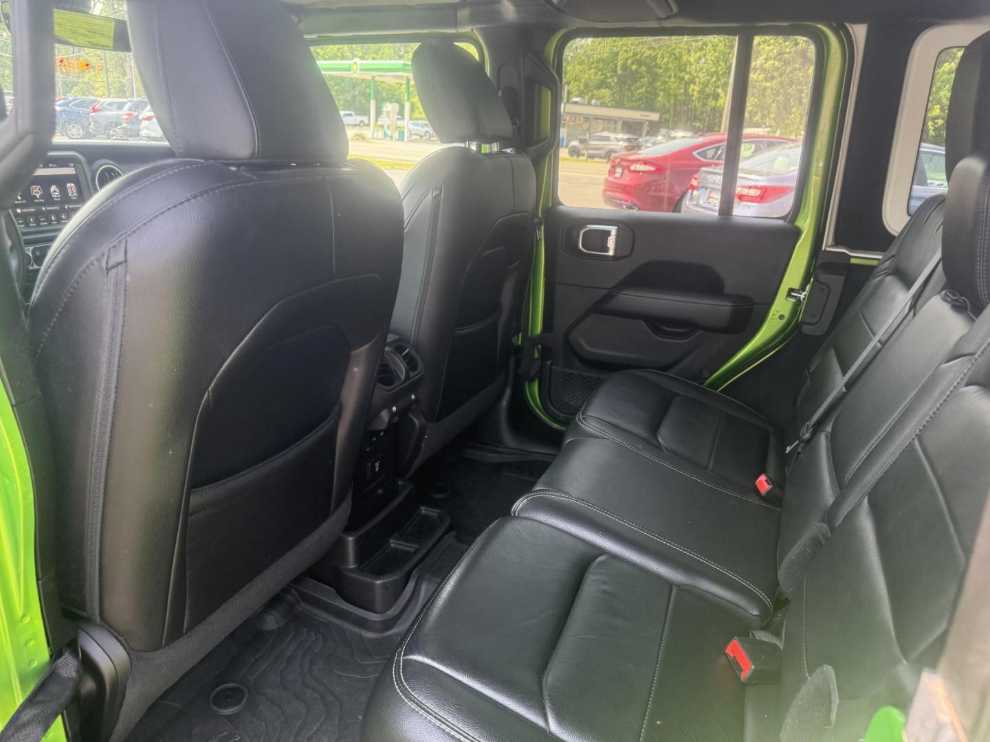 2019 Green /Black Jeep Wrangler Unlimited Sahara (1C4HJXEG1KW) with an 3.6L V6 DOHC 24V engine, 8-Speed Automatic transmission, located at 11115 Chardon Rd. , Chardon, OH, 44024, (440) 214-9705, 41.580246, -81.241943 - Photo#28