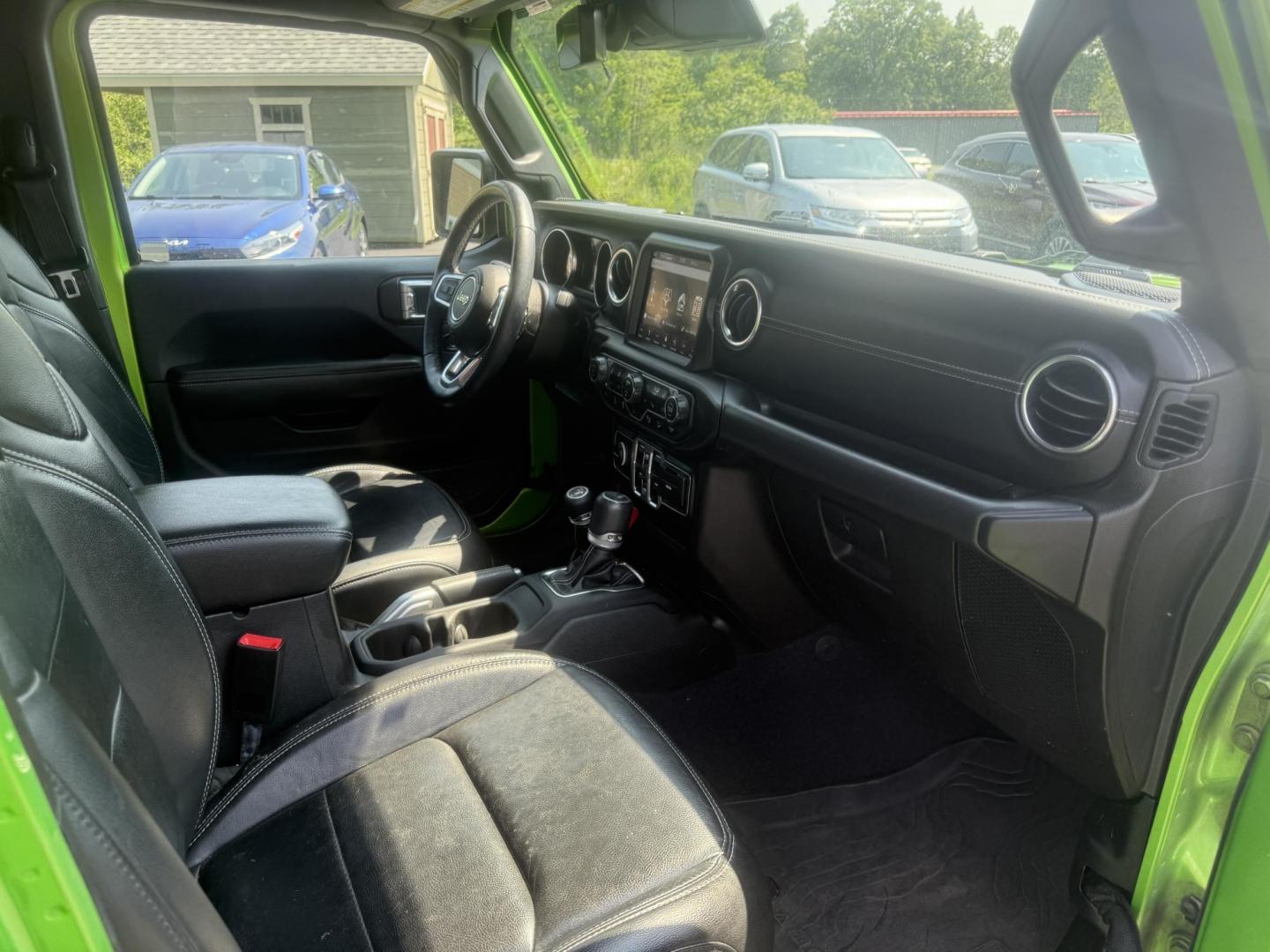2019 Green /Black Jeep Wrangler Unlimited Sahara (1C4HJXEG1KW) with an 3.6L V6 DOHC 24V engine, 8-Speed Automatic transmission, located at 11115 Chardon Rd. , Chardon, OH, 44024, (440) 214-9705, 41.580246, -81.241943 - Photo#37