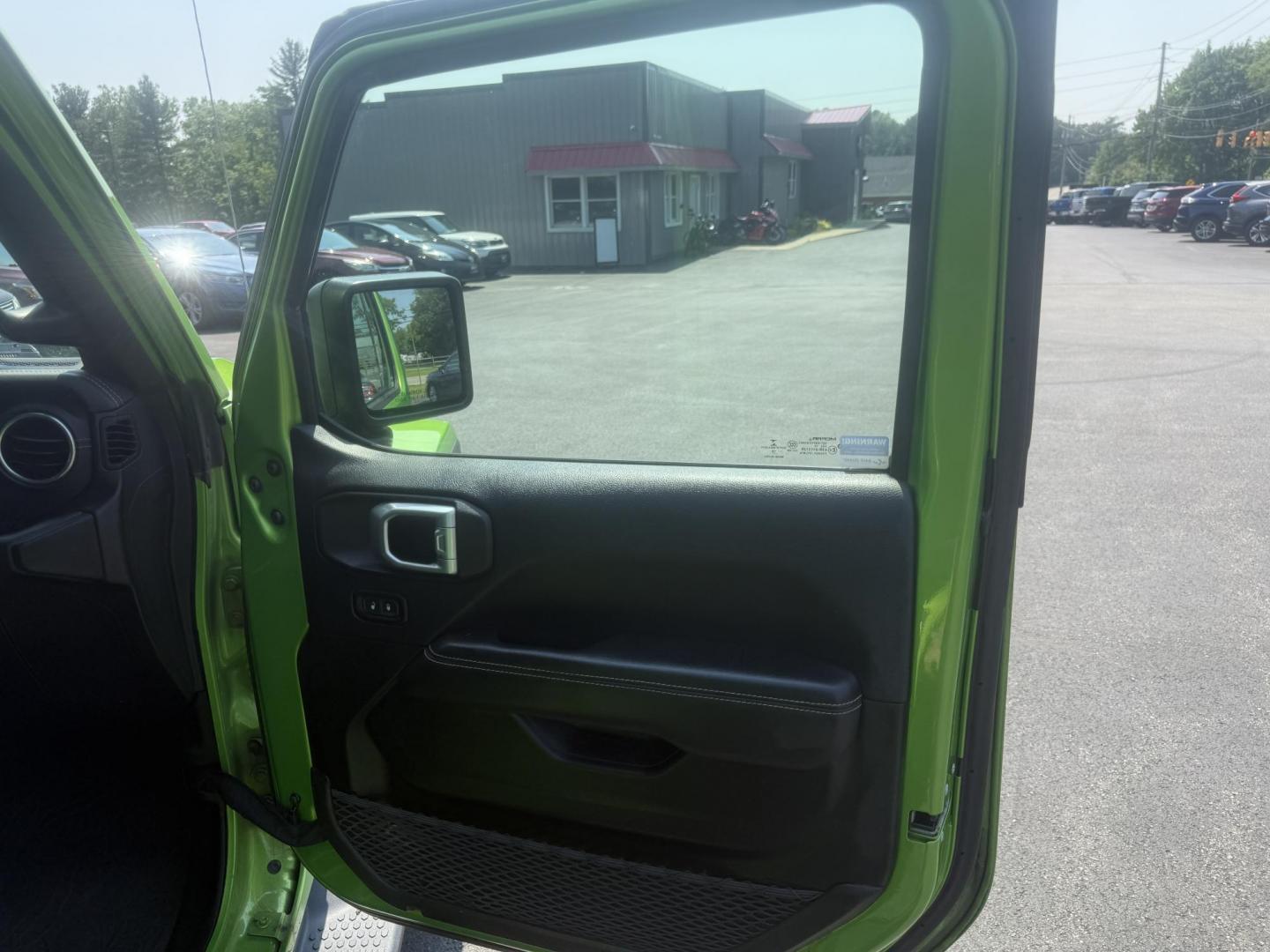 2019 Green /Black Jeep Wrangler Unlimited Sahara (1C4HJXEG1KW) with an 3.6L V6 DOHC 24V engine, 8-Speed Automatic transmission, located at 11115 Chardon Rd. , Chardon, OH, 44024, (440) 214-9705, 41.580246, -81.241943 - Photo#40