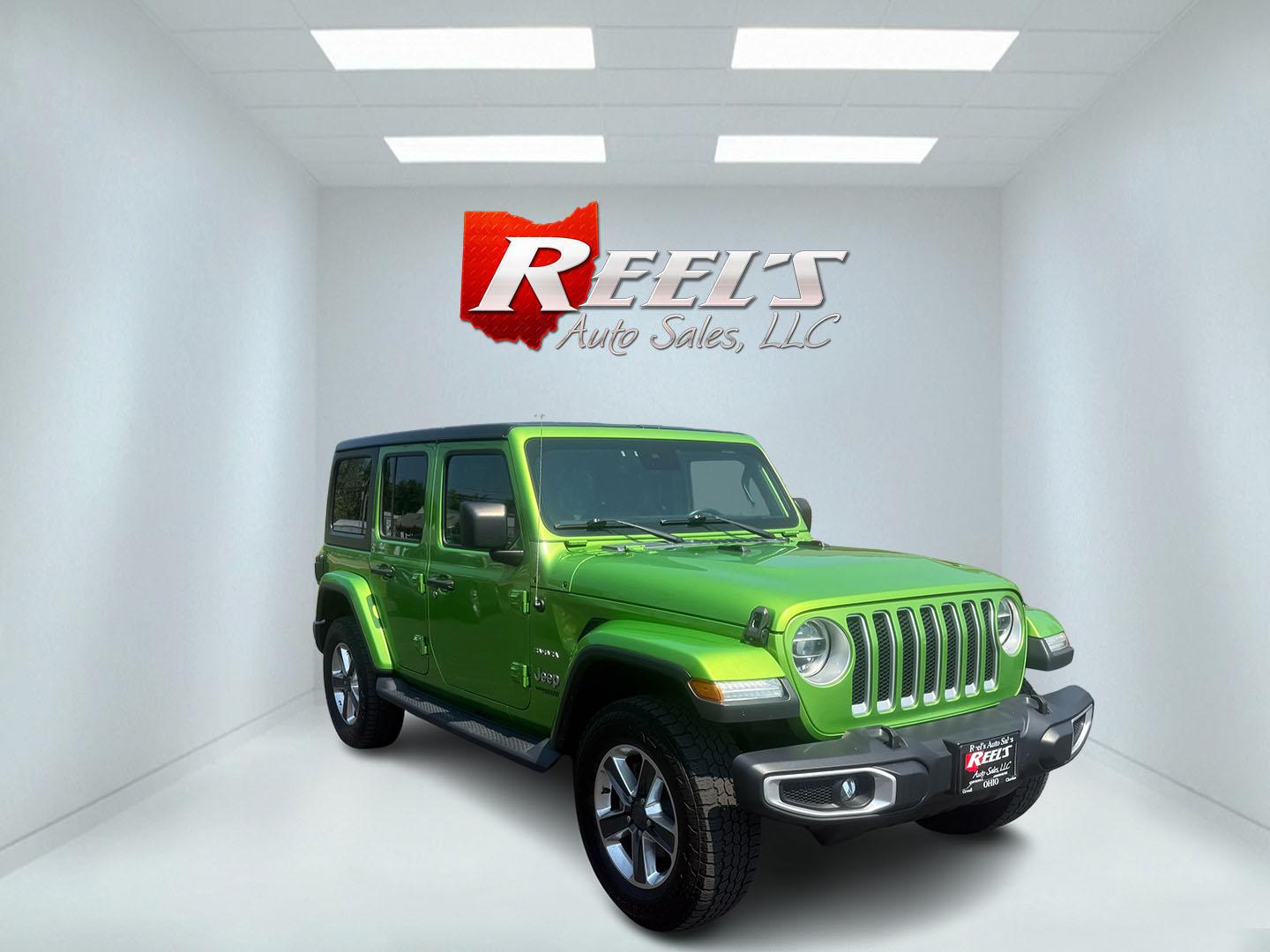 2019 Green /Black Jeep Wrangler Unlimited Sahara (1C4HJXEG1KW) with an 3.6L V6 DOHC 24V engine, 8-Speed Automatic transmission, located at 11115 Chardon Rd. , Chardon, OH, 44024, (440) 214-9705, 41.580246, -81.241943 - Photo#2