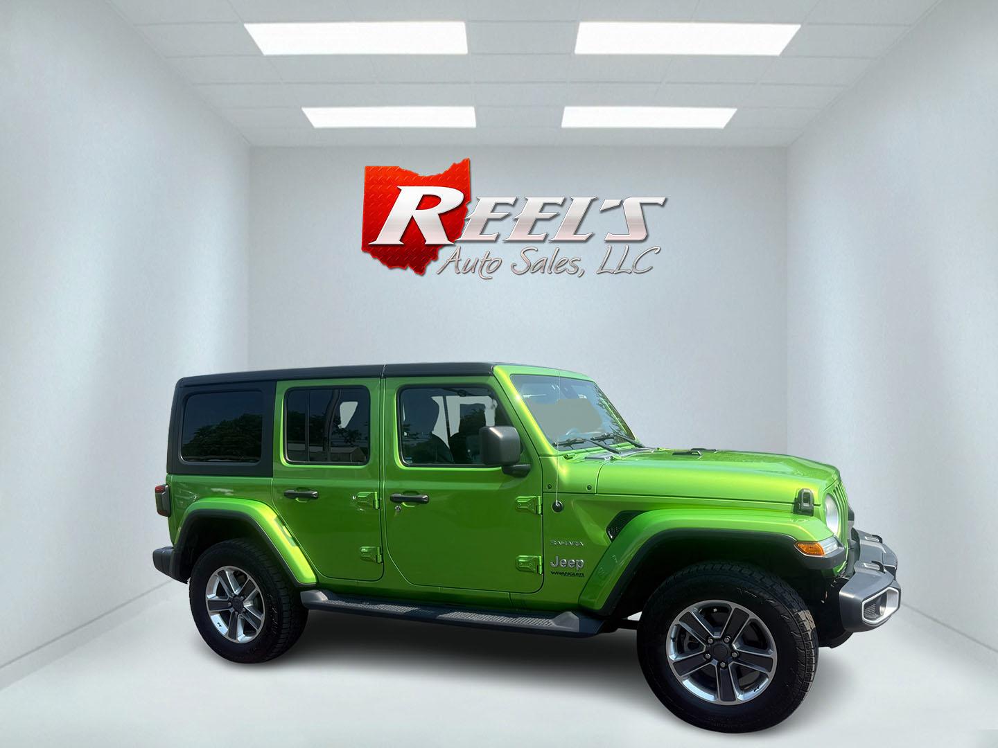 2019 Green /Black Jeep Wrangler Unlimited Sahara (1C4HJXEG1KW) with an 3.6L V6 DOHC 24V engine, 8-Speed Automatic transmission, located at 11115 Chardon Rd. , Chardon, OH, 44024, (440) 214-9705, 41.580246, -81.241943 - Photo#14