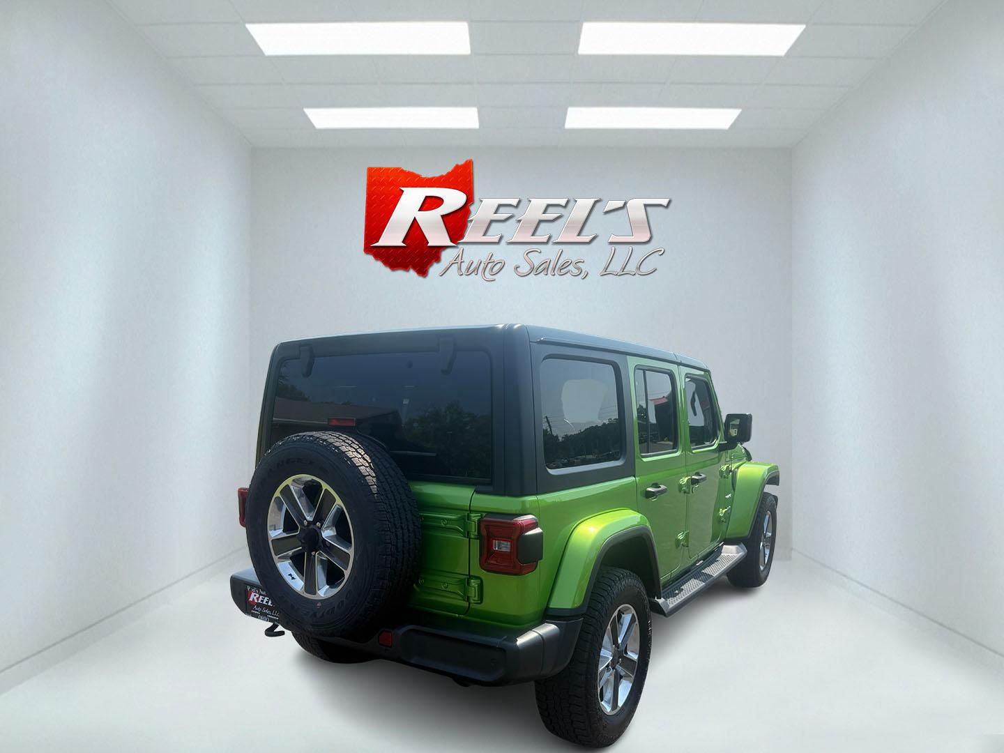 2019 Green /Black Jeep Wrangler Unlimited Sahara (1C4HJXEG1KW) with an 3.6L V6 DOHC 24V engine, 8-Speed Automatic transmission, located at 11115 Chardon Rd. , Chardon, OH, 44024, (440) 214-9705, 41.580246, -81.241943 - Photo#42