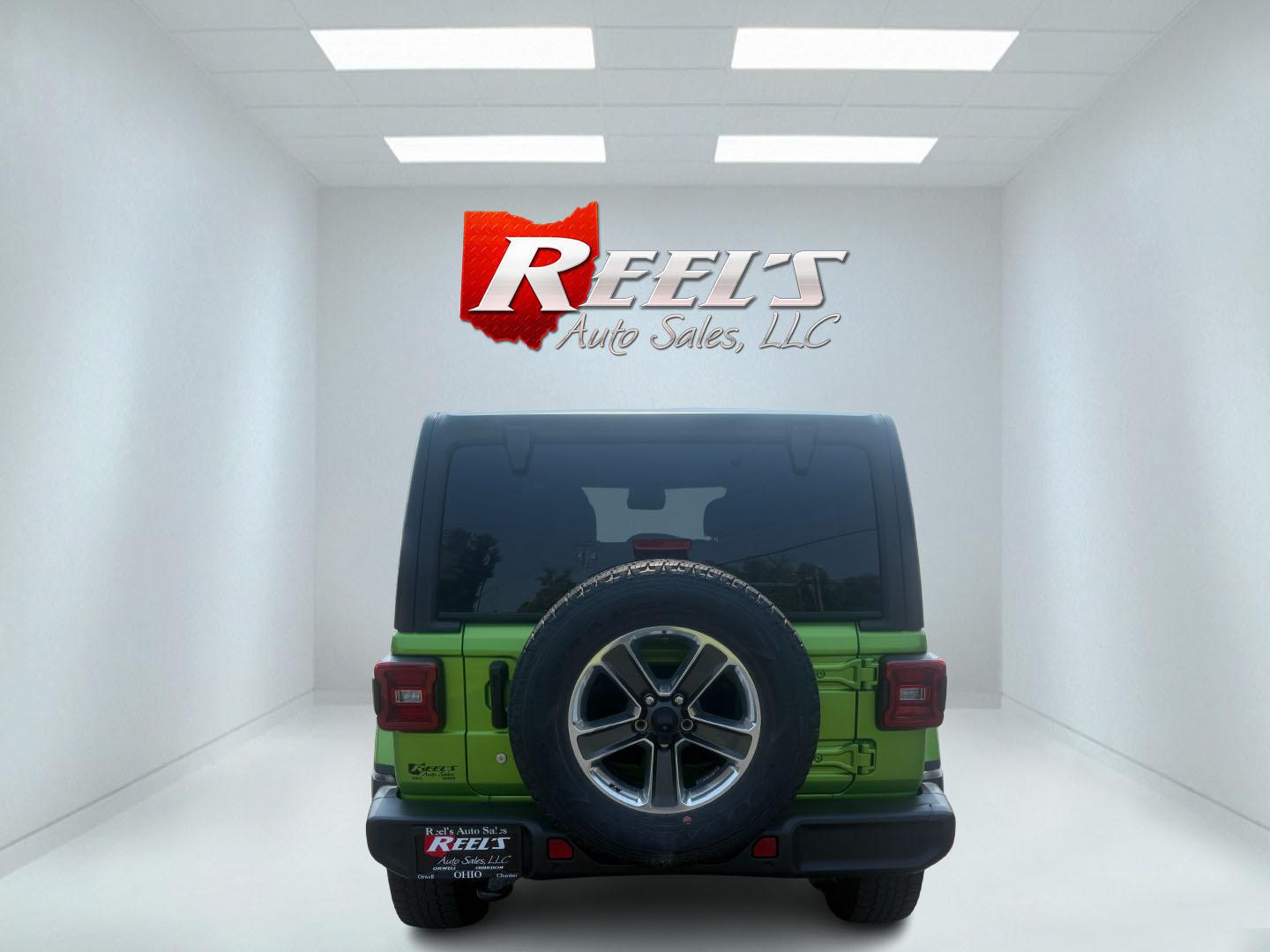 2019 Green /Black Jeep Wrangler Unlimited Sahara (1C4HJXEG1KW) with an 3.6L V6 DOHC 24V engine, 8-Speed Automatic transmission, located at 11115 Chardon Rd. , Chardon, OH, 44024, (440) 214-9705, 41.580246, -81.241943 - Photo#43
