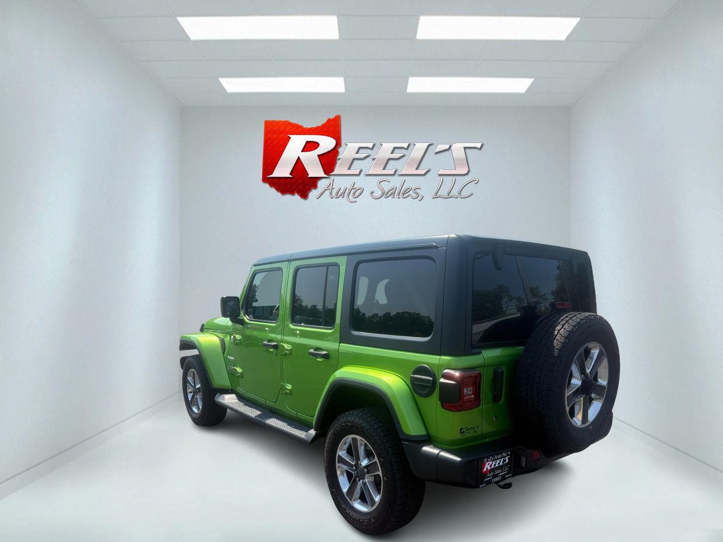 2019 Green /Black Jeep Wrangler Unlimited Sahara (1C4HJXEG1KW) with an 3.6L V6 DOHC 24V engine, 8-Speed Automatic transmission, located at 11115 Chardon Rd. , Chardon, OH, 44024, (440) 214-9705, 41.580246, -81.241943 - Photo#44